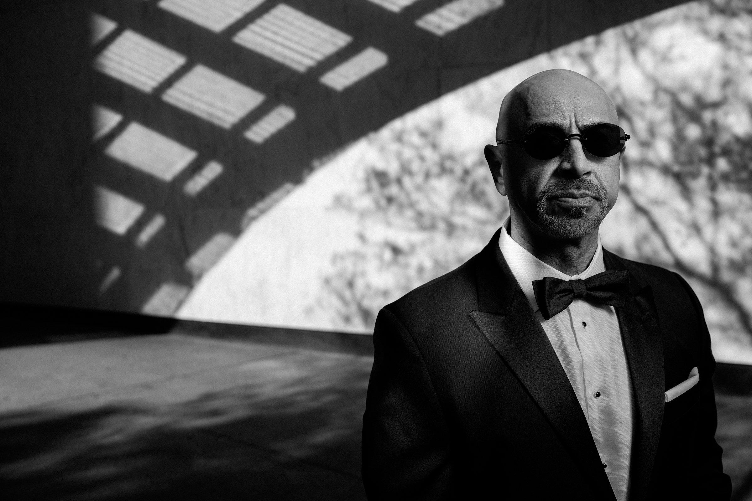 Environmental portrait of Sam Altawil in downtown Sacramento photographed with dramatic natural light and strobe.