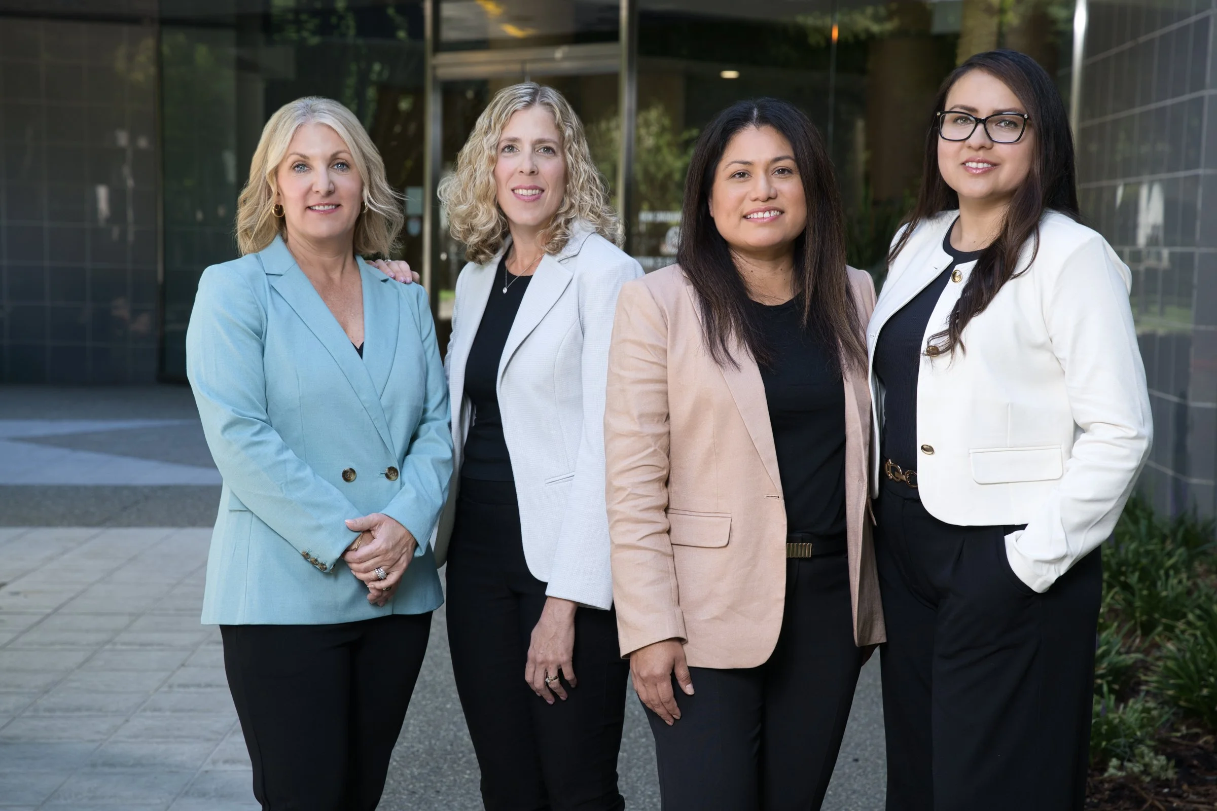 Corporate team headshots four women in blazers, outdoor on-location portrait, Sacramento CA