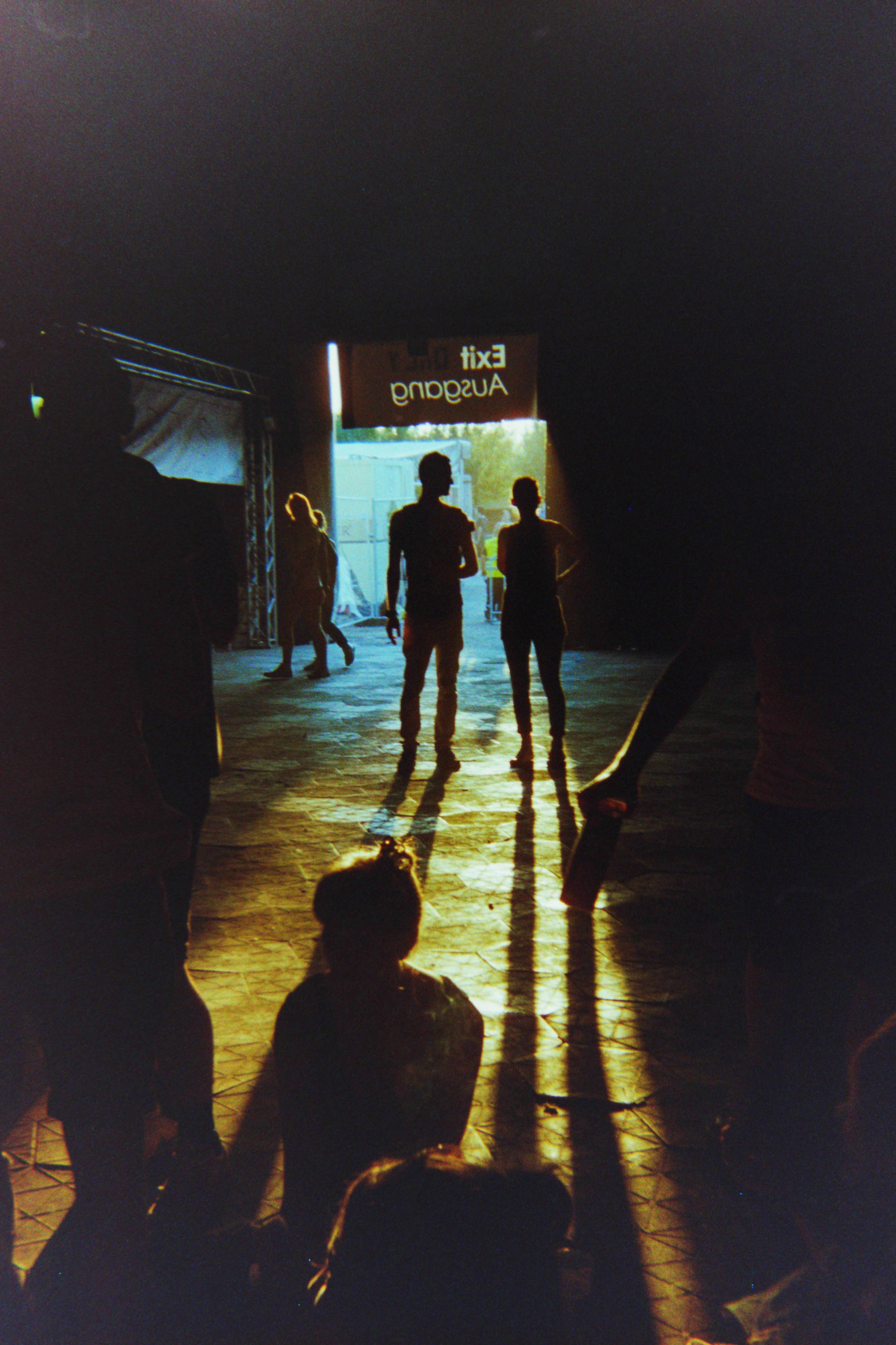A shadowy crowd & a sliver of sun