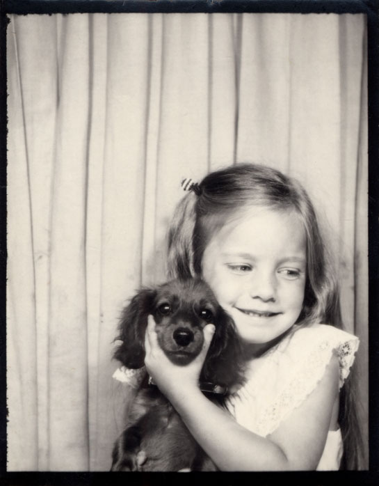 Girl with beloved pet dog