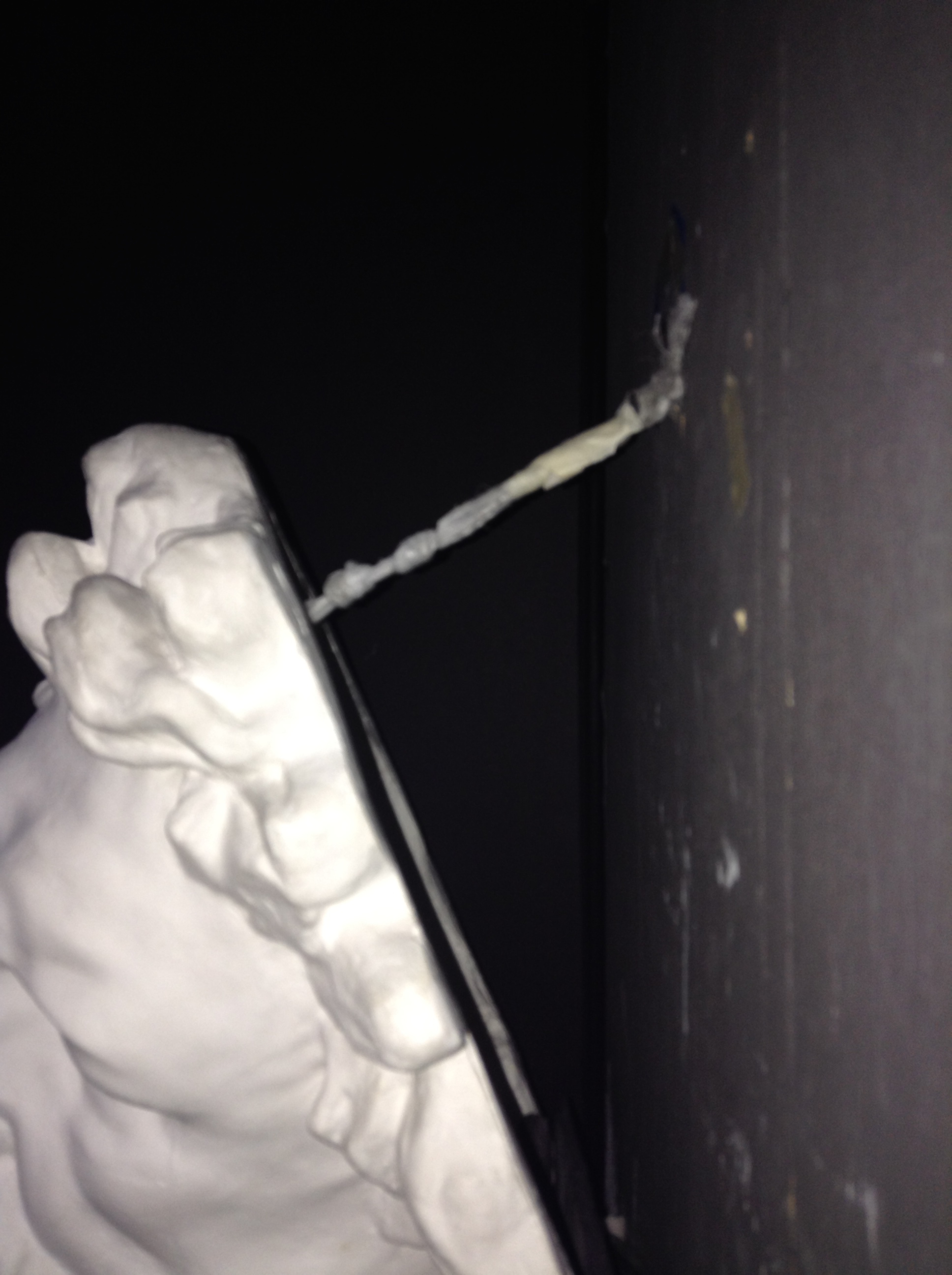 The top of the cast is about 5 inches from the wall.