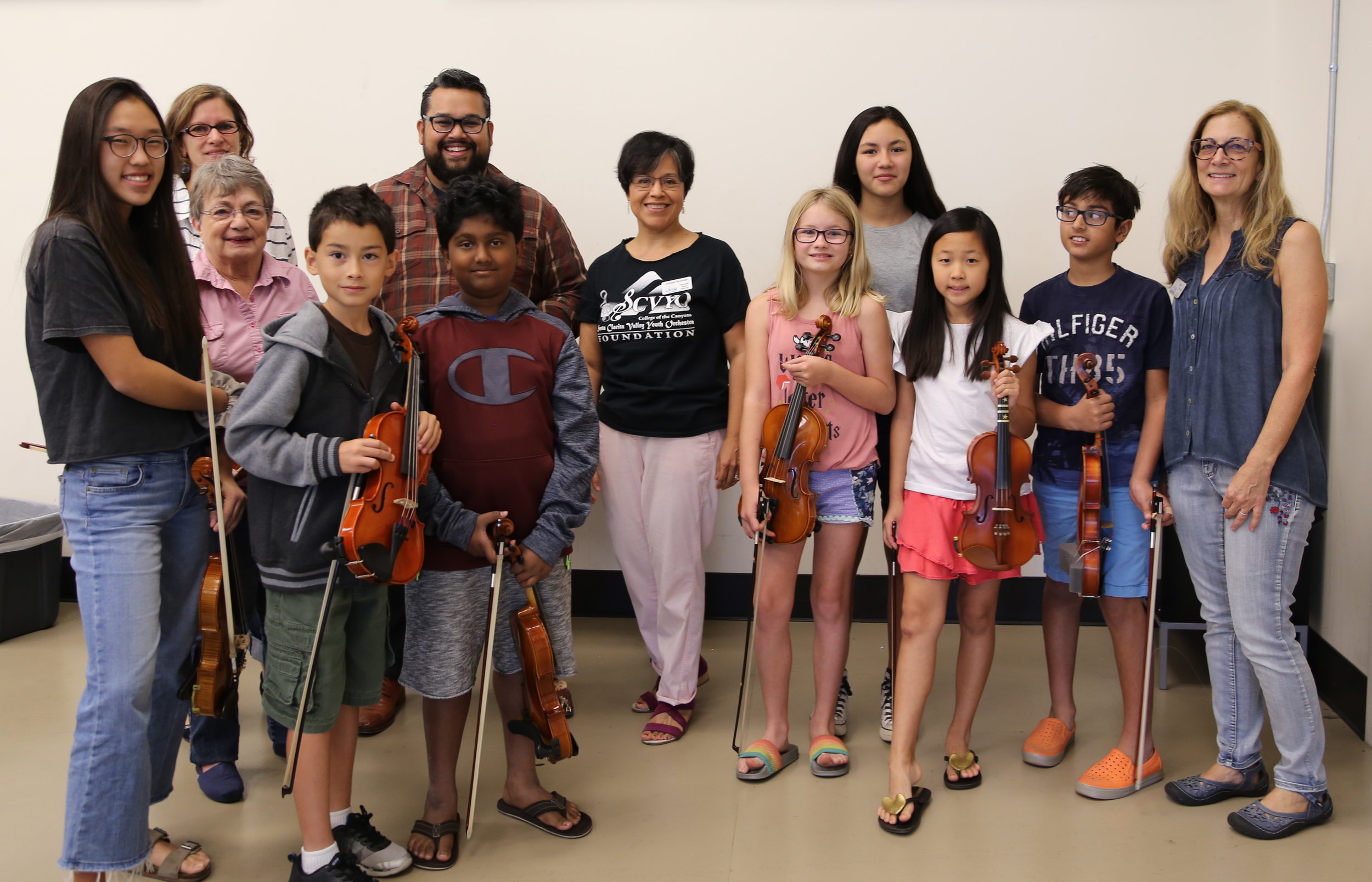 Vijay Gupta, LA Philharmonic Violinist with Julissa Bozman, SCVYO Associated Artistic Director and members of Prelude Strings
