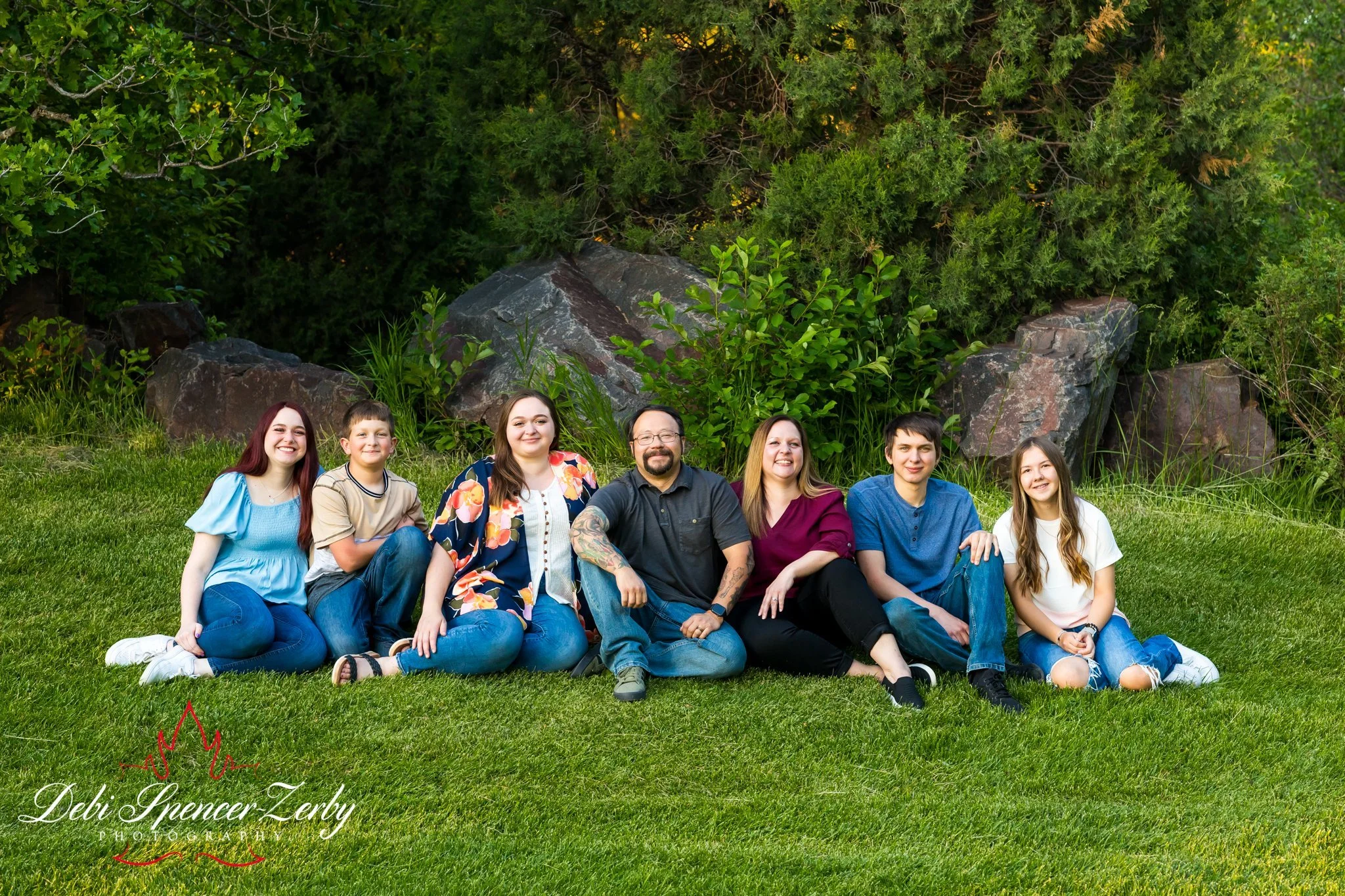 Family portrait session in natural surroundings.