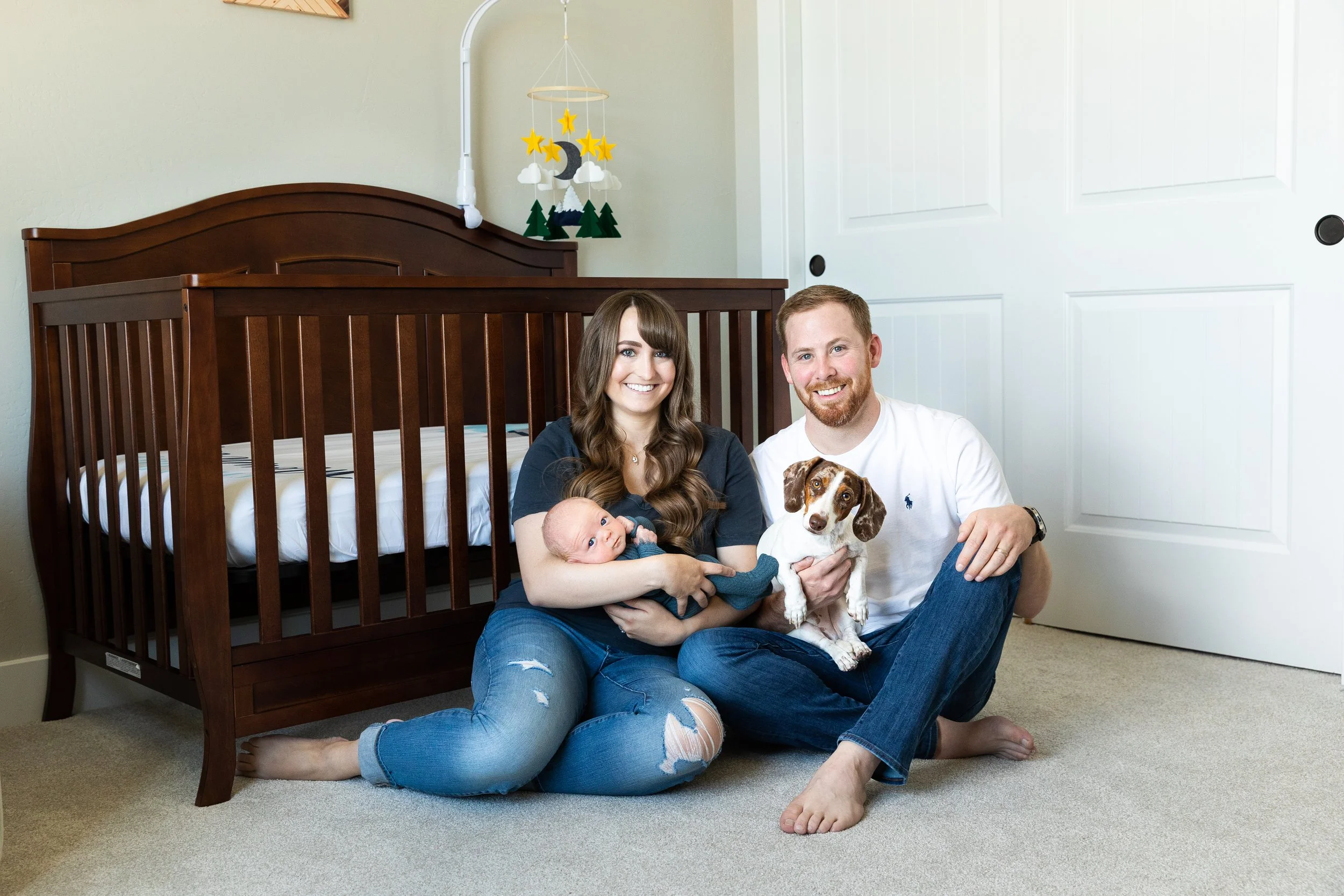 Family with newborn in lifestyle home session