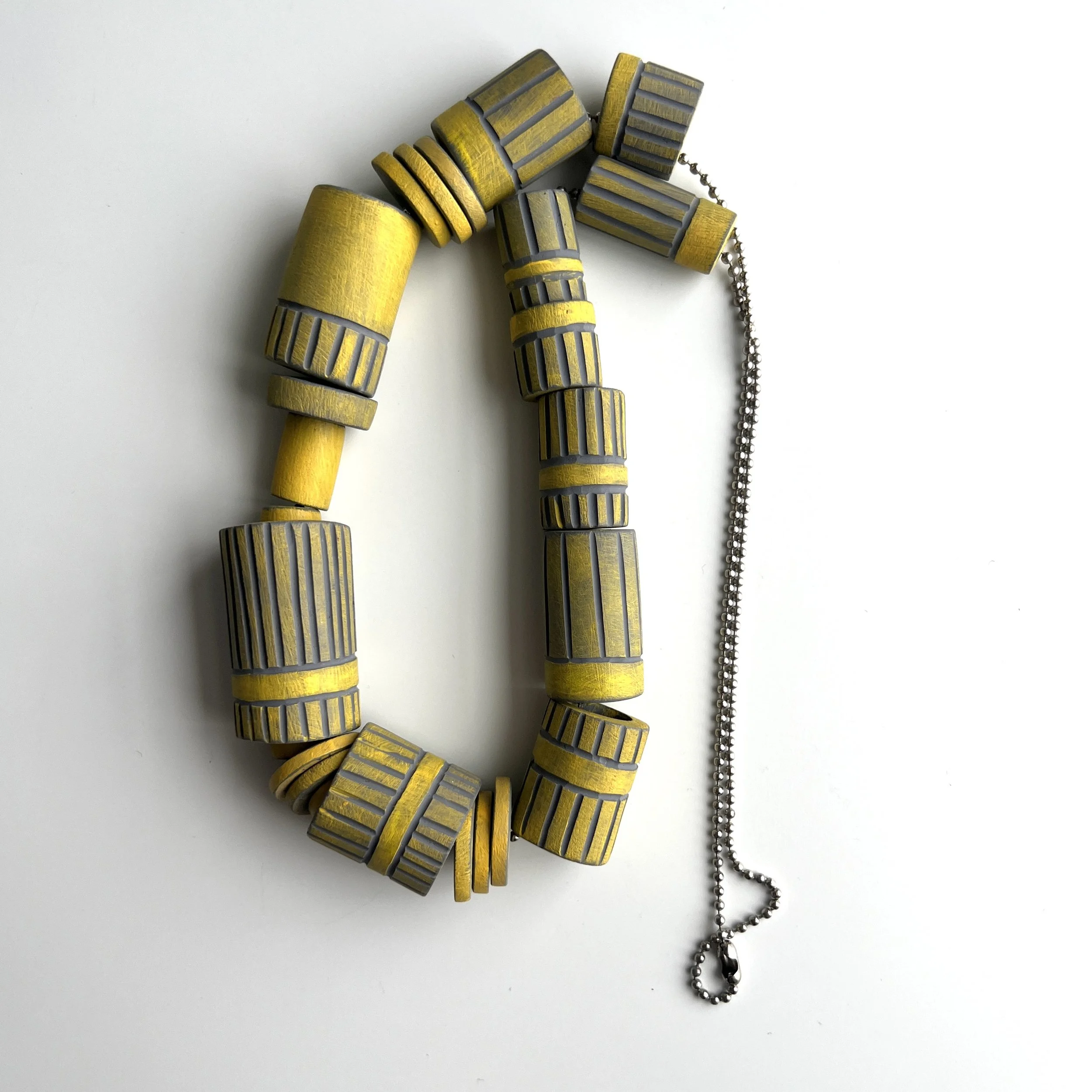 carved-yellow-grey-polymer-clay-necklace.JPG