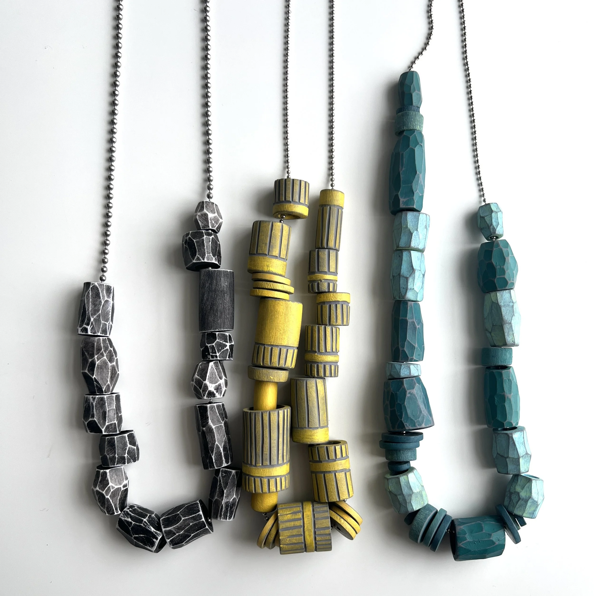 carved-polymer-necklaces.JPG