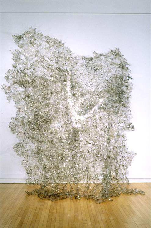 "Collisional Ejection from an Atmosphere" 116" x 104" x 54", Scientific transparencies and papers, wire, glue, burning; 1998