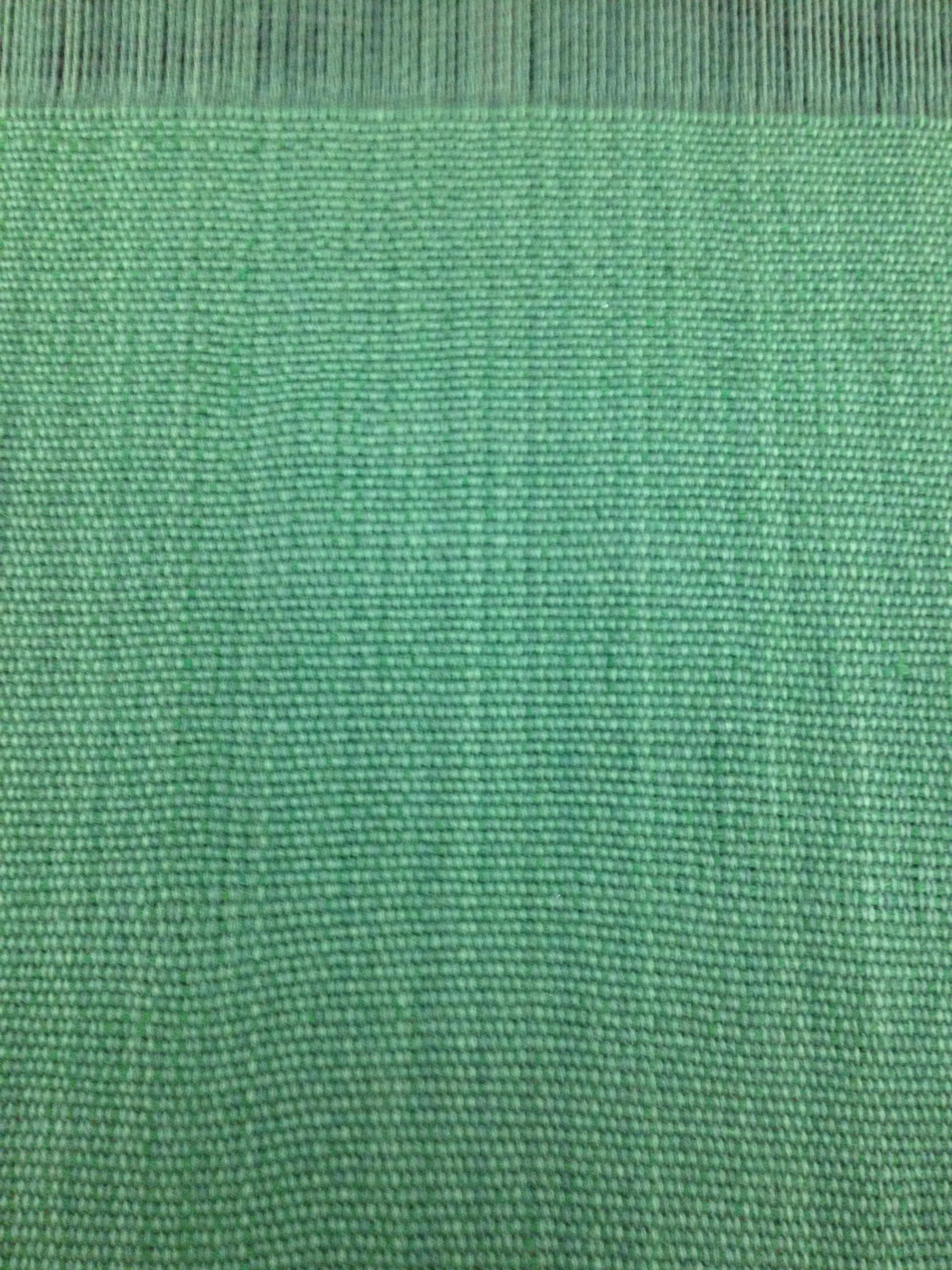 High quality close up of the fabric for Domestic Sofa In Green Handwoven Fabric