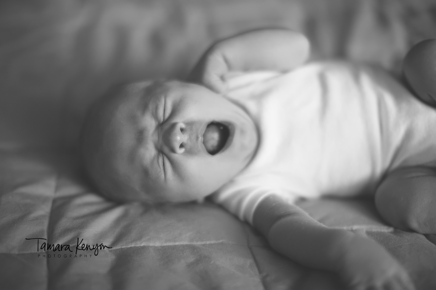 yawning baby boy