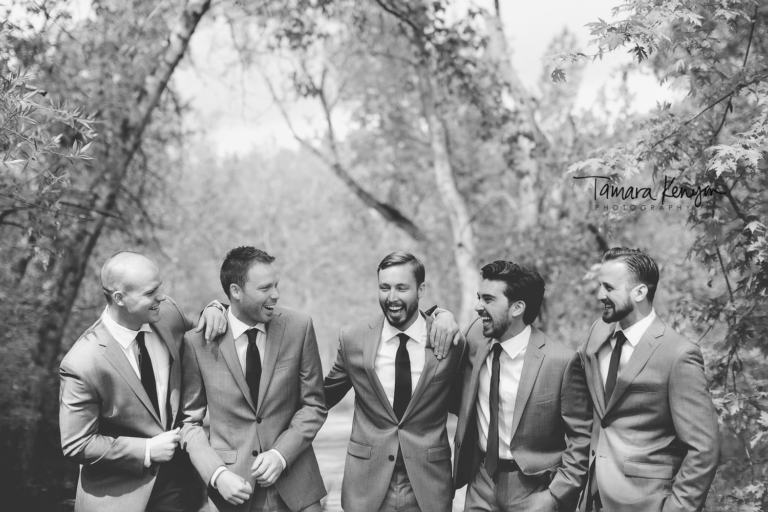 candid groomsmen wedding photographer in boise