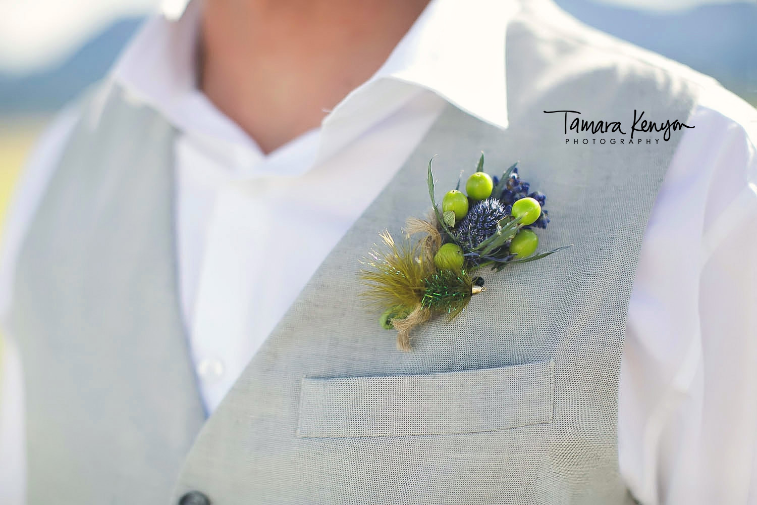 wedding boutineer with fly fishing Tara Bella Flowers