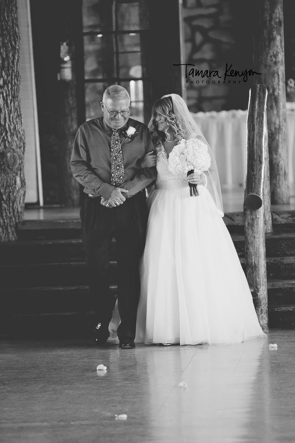 father walking daughter down the aisle