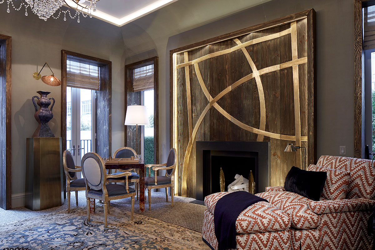 Embossed gold leaf fire place surround finished by Osmundo Studio for David Kleinberg