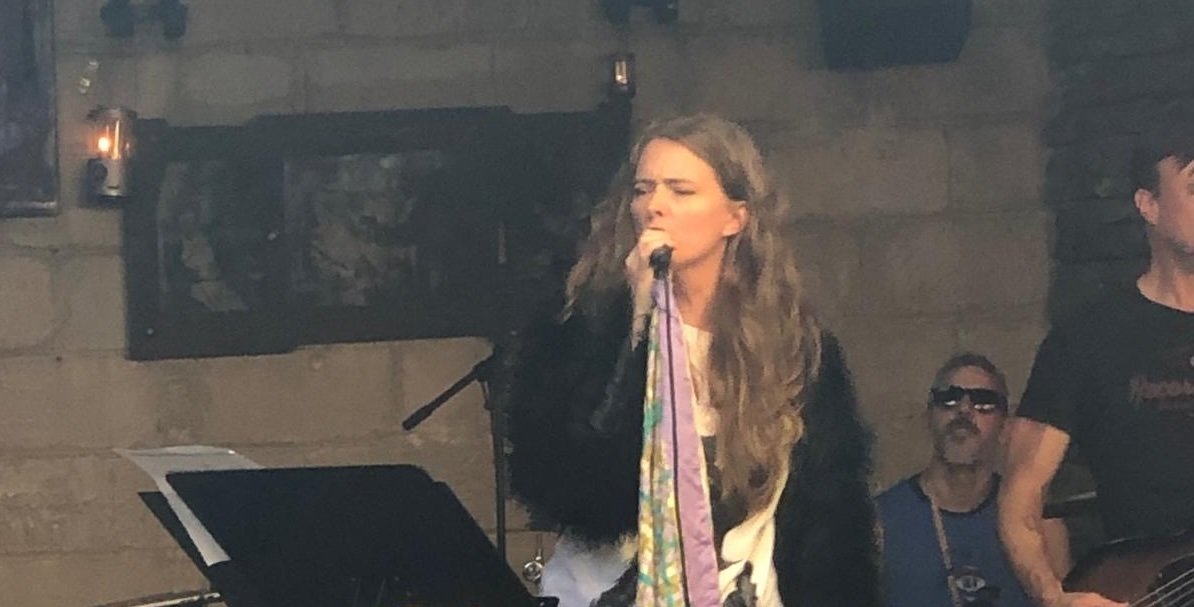 Catherine singing her heart out as she covers PJ Harvey