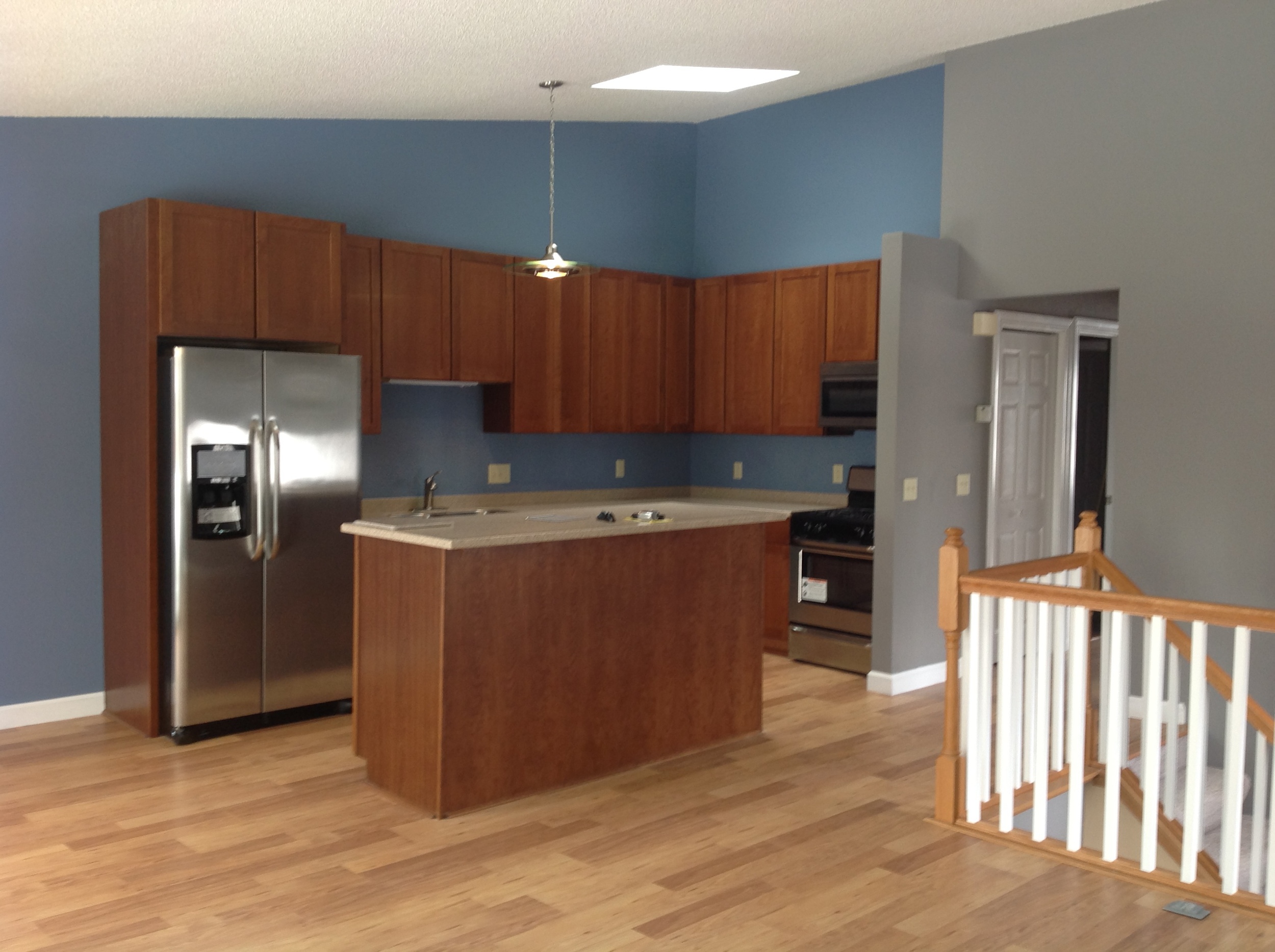 New Kitchen with stainless steel appliances, solid stone counter top, and lots of cabinet space. 