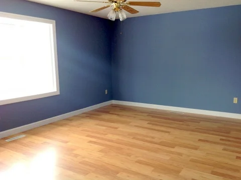  Large Master bedroom with bay windows providing natural light. 