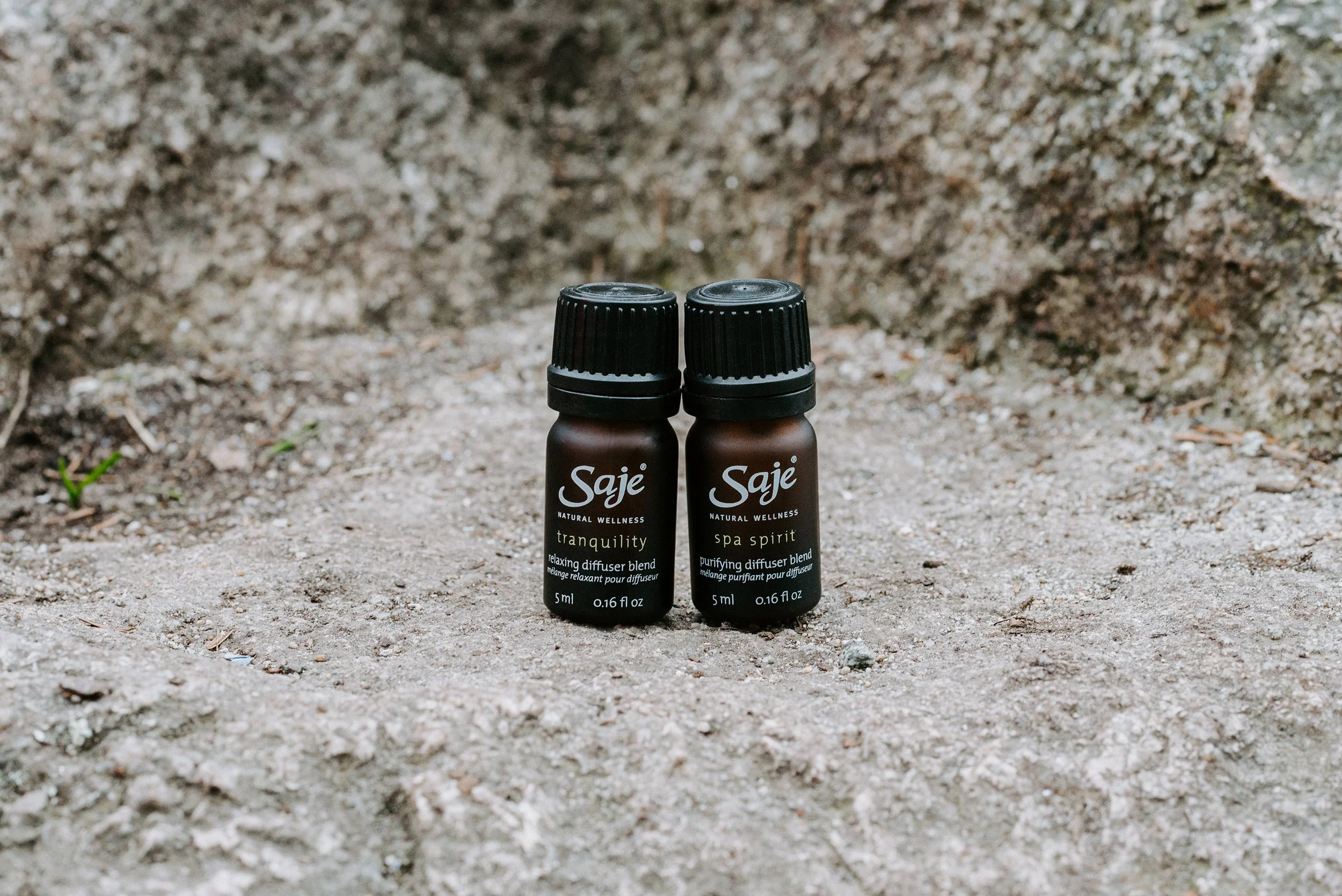 saje-essential-oils-on-rock.jpg