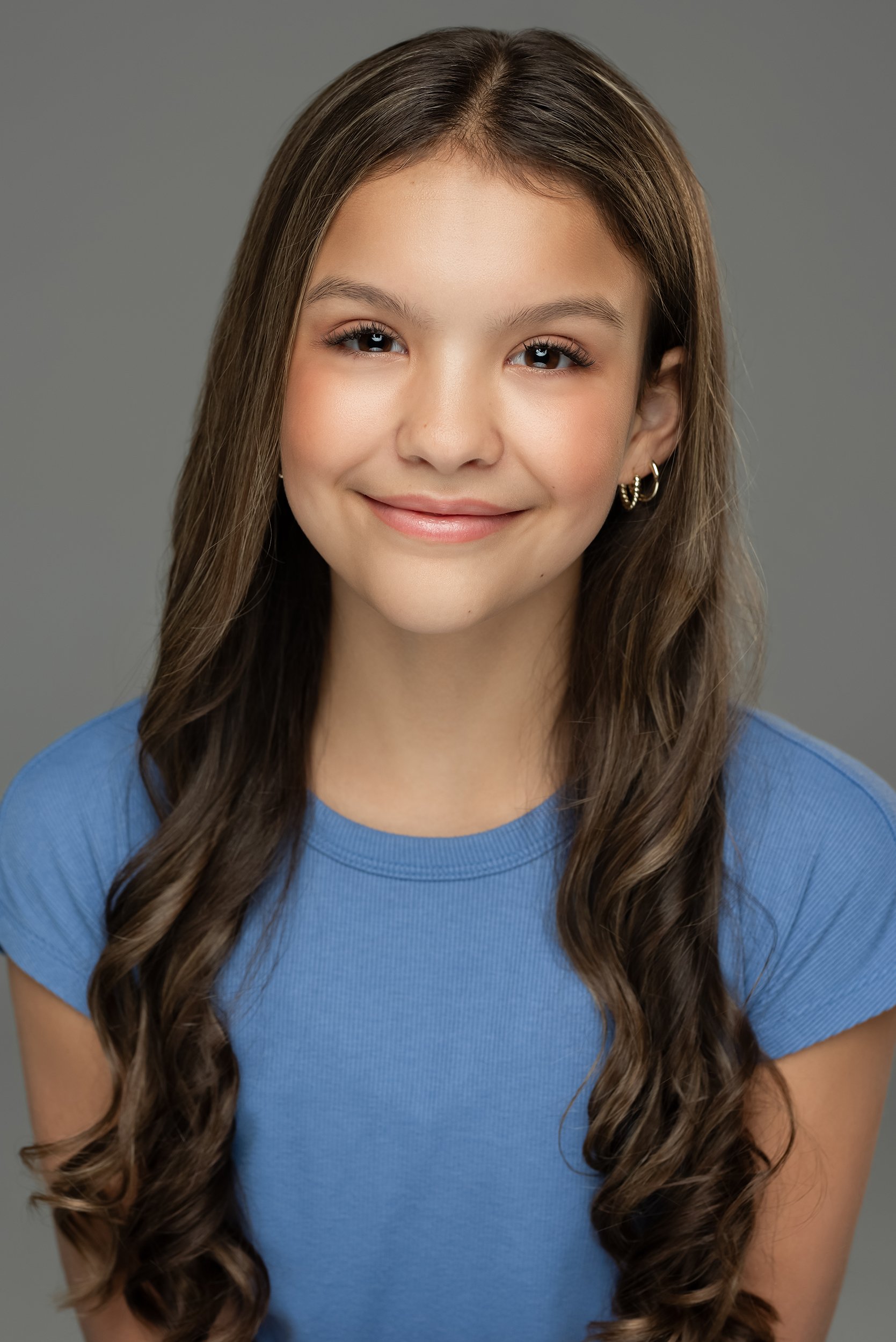 girl-in-blue-top-headshot.jpg