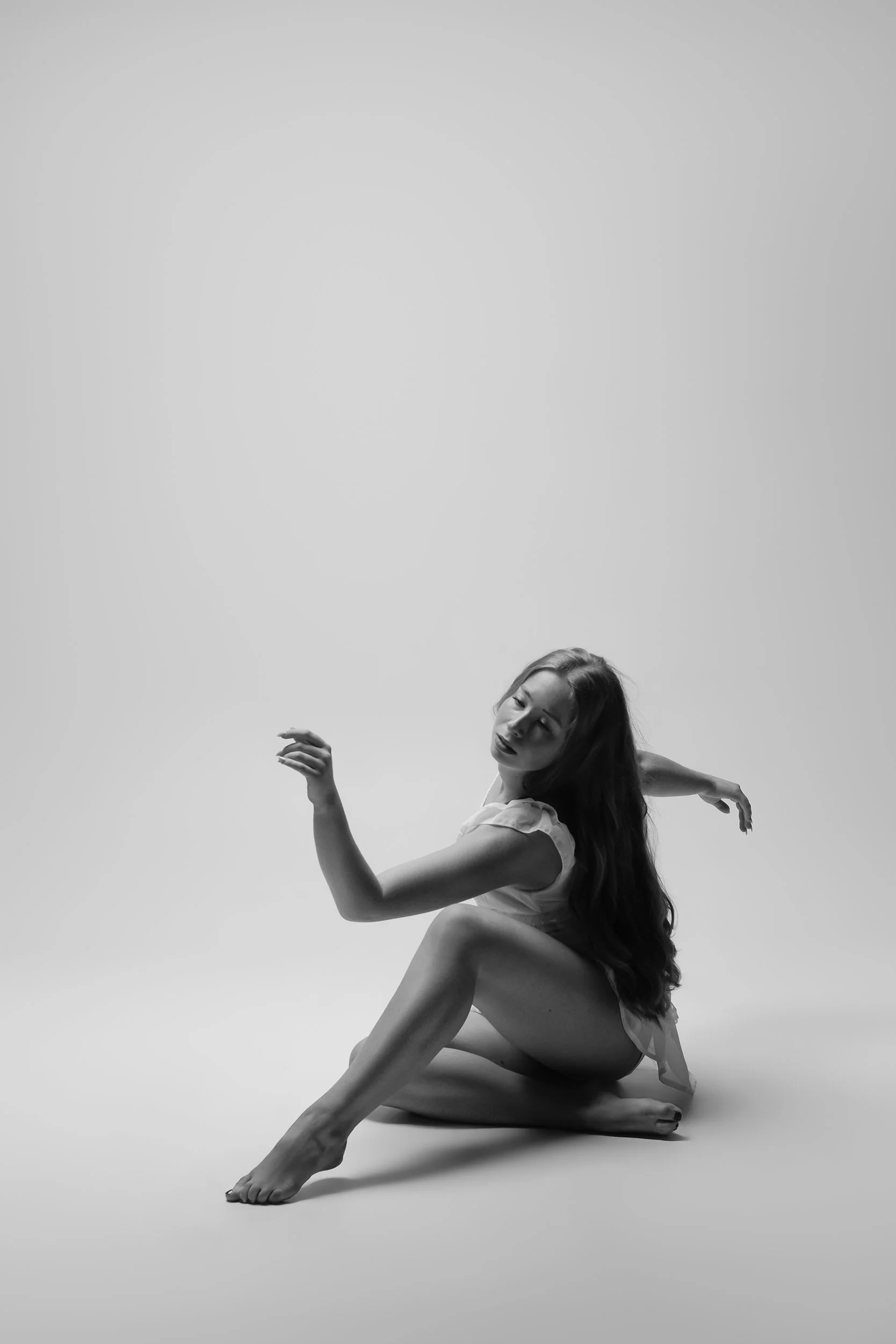 dancer-seated-reaching.jpg