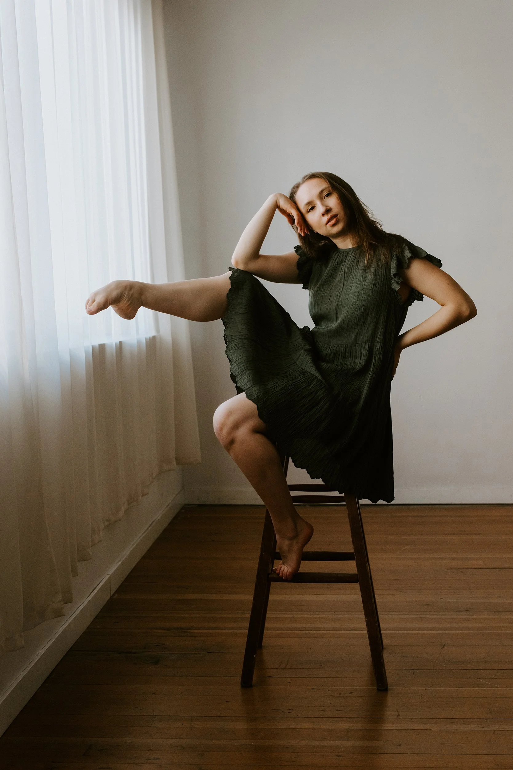 dancer-seated-on-stool.jpg