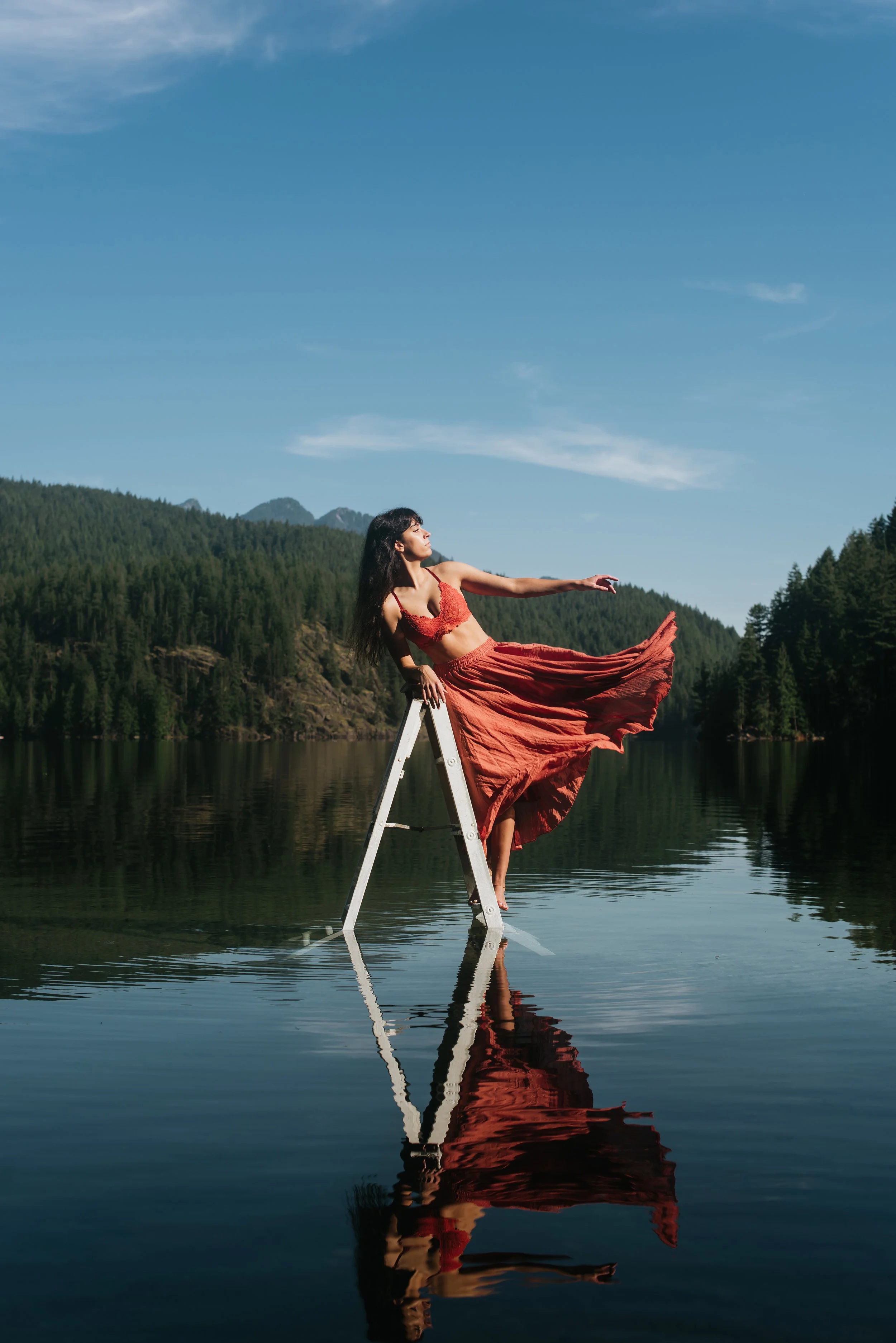 portrait-in-water-on-a-ladder-throwing-skirt.jpg