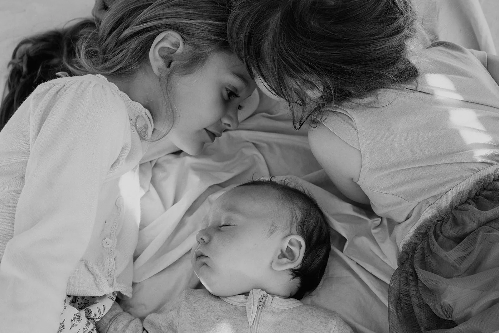 three-kids-on-blanket.jpg