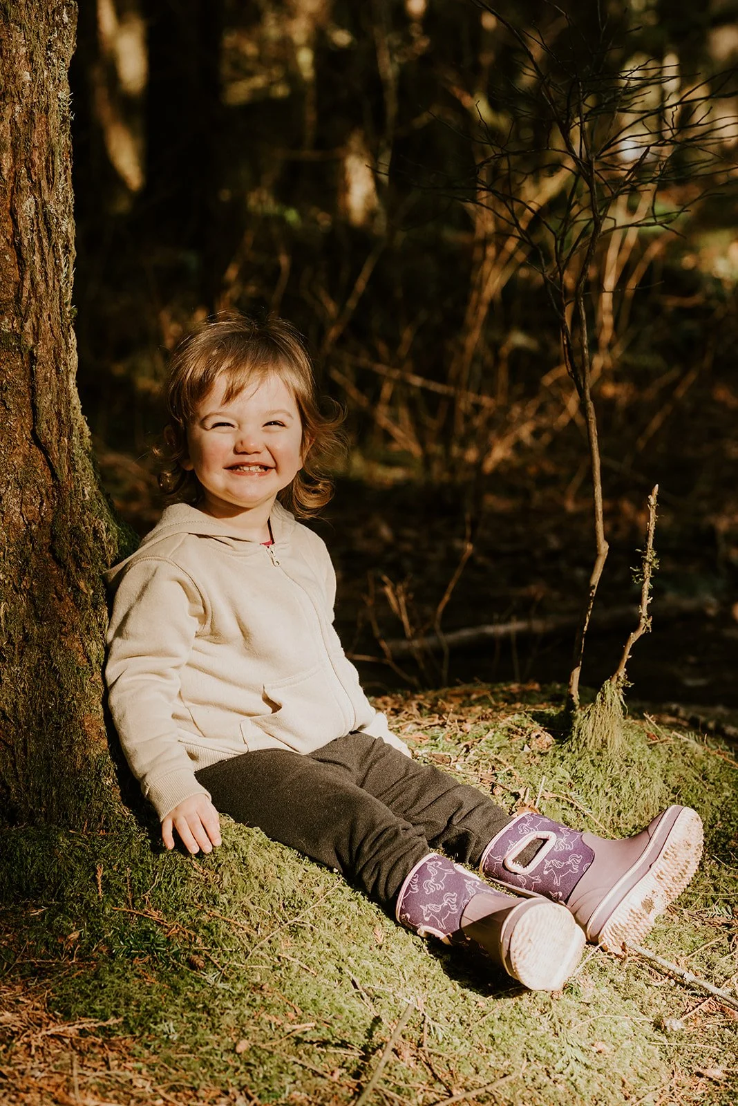 kid-sitting-on-tree.jpg