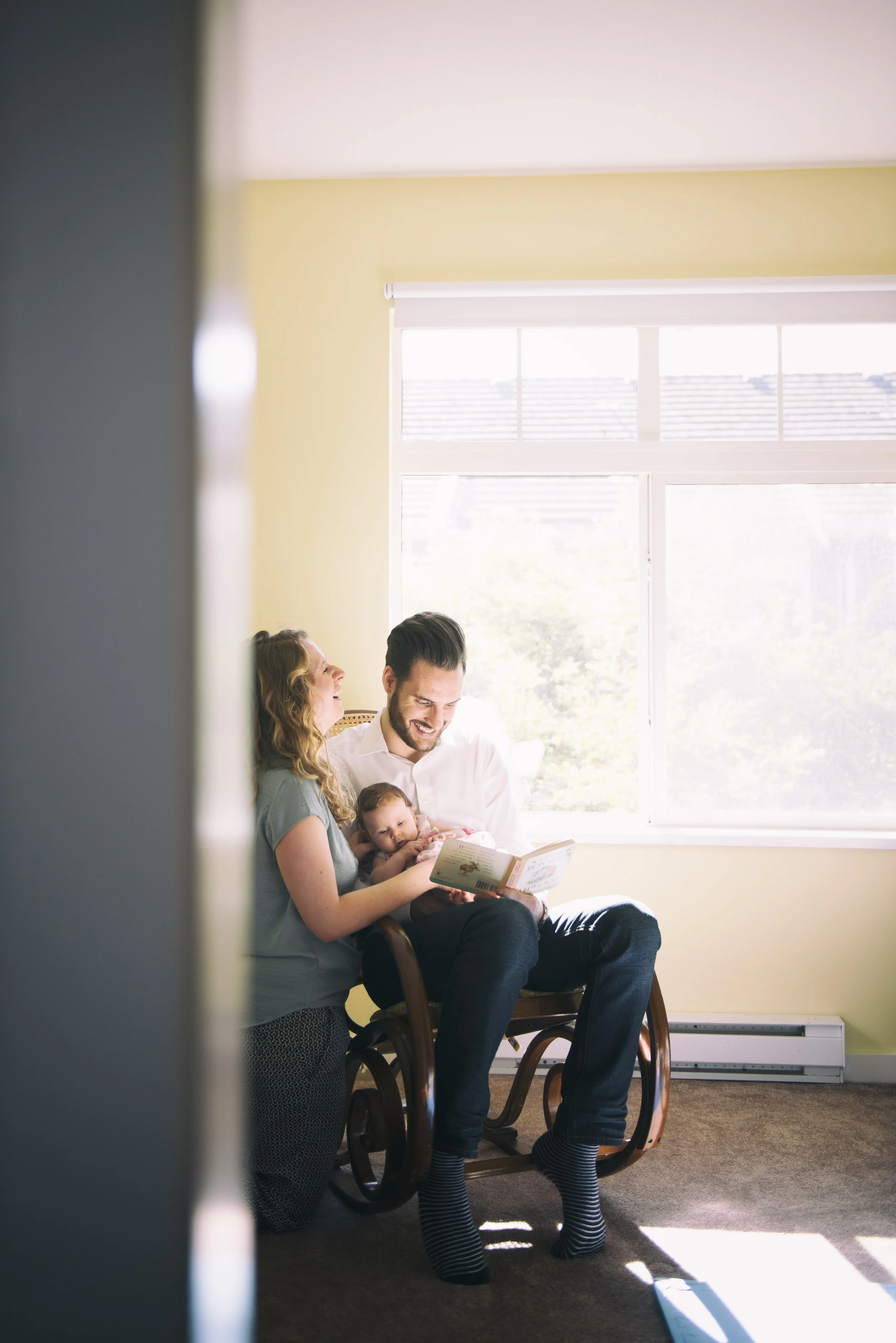 couple-and-baby-reading-books.jpg