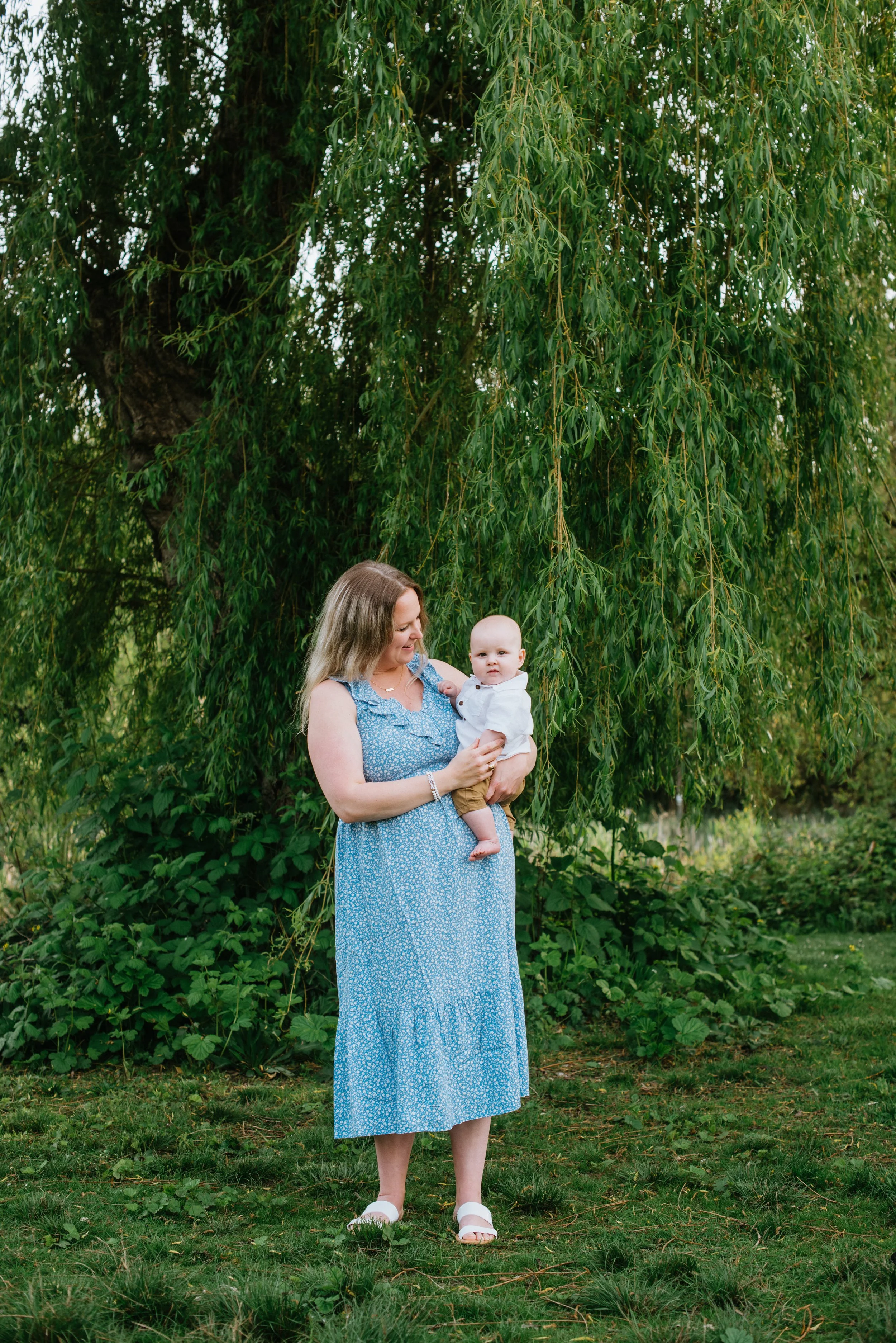 mom-holding-baby-willow-tree.jpg