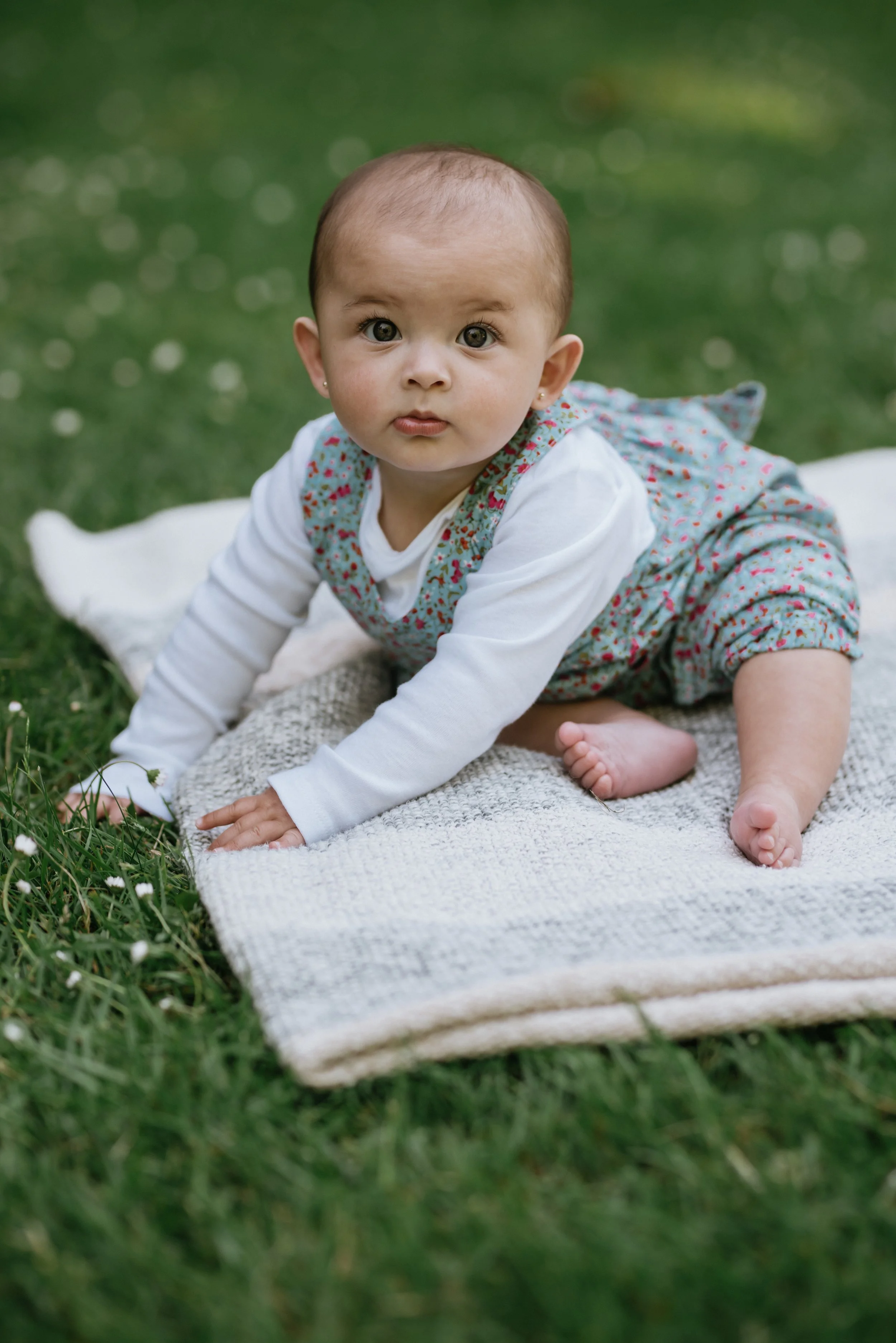 baby-sitting-on-grass.jpg