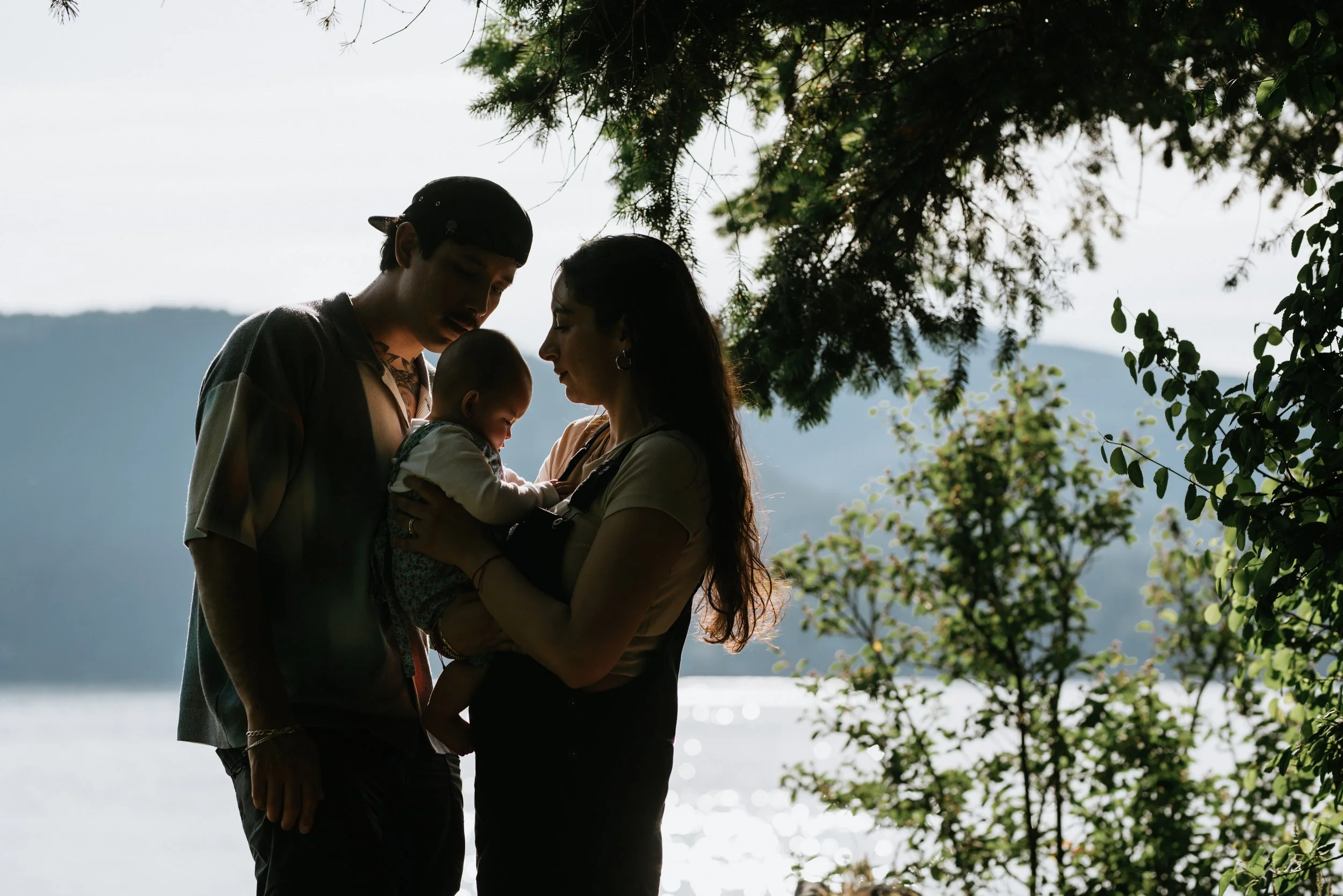 family-of-three-infront-of-scenic-mountains.jpg