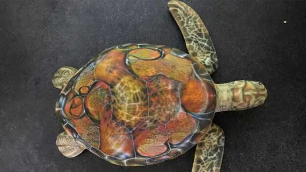 美團隊 3D 列印出的這隻玩具烏龜，對 Google AI 來說怎麼看都是把步槍