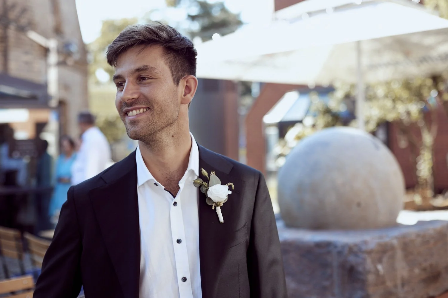 Portrait of a smiling groom.