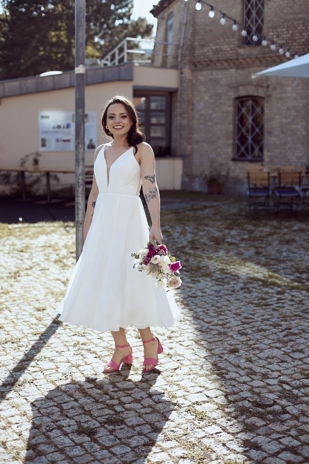 A happy bride twirling.