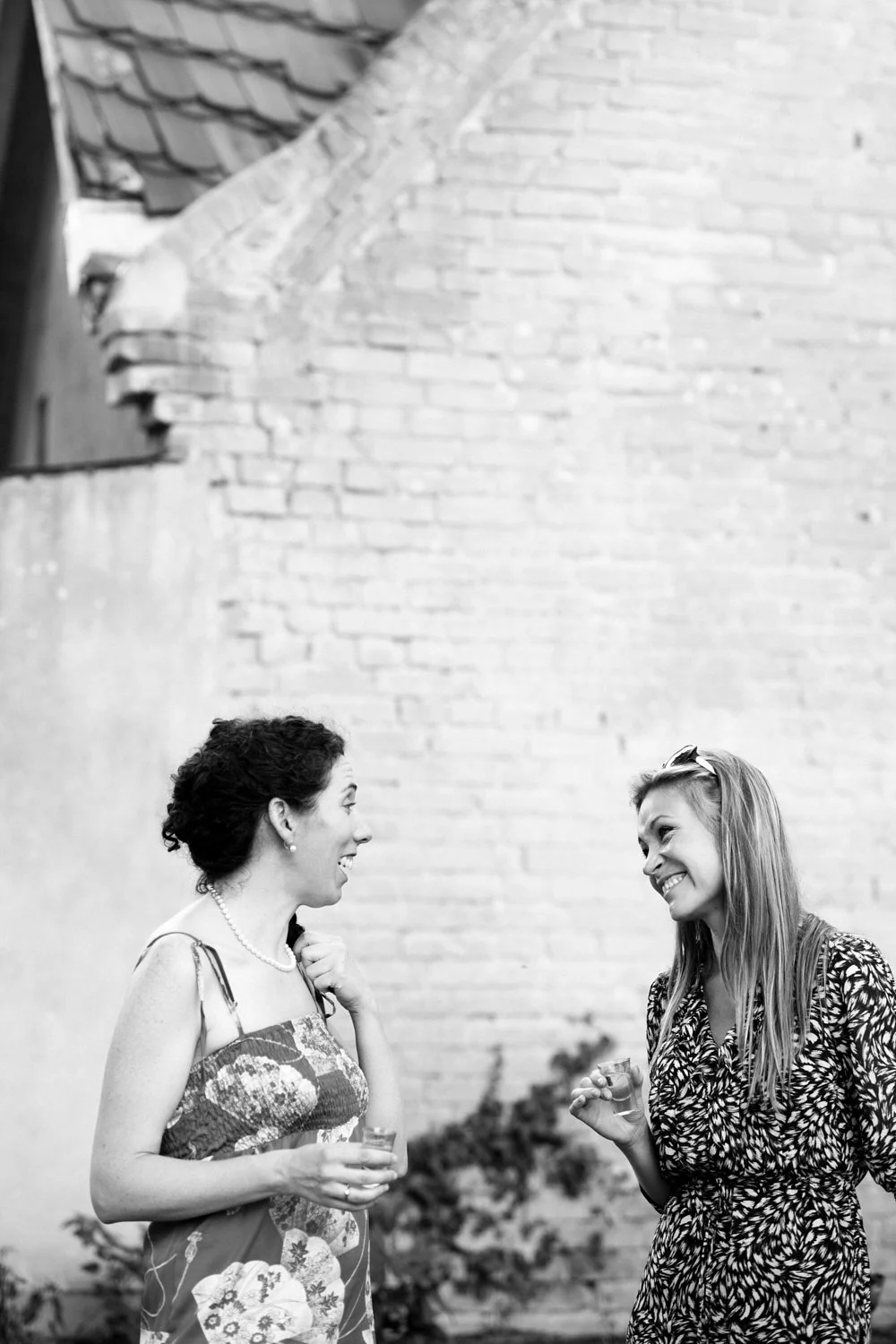 Wedding guests talking to each other.