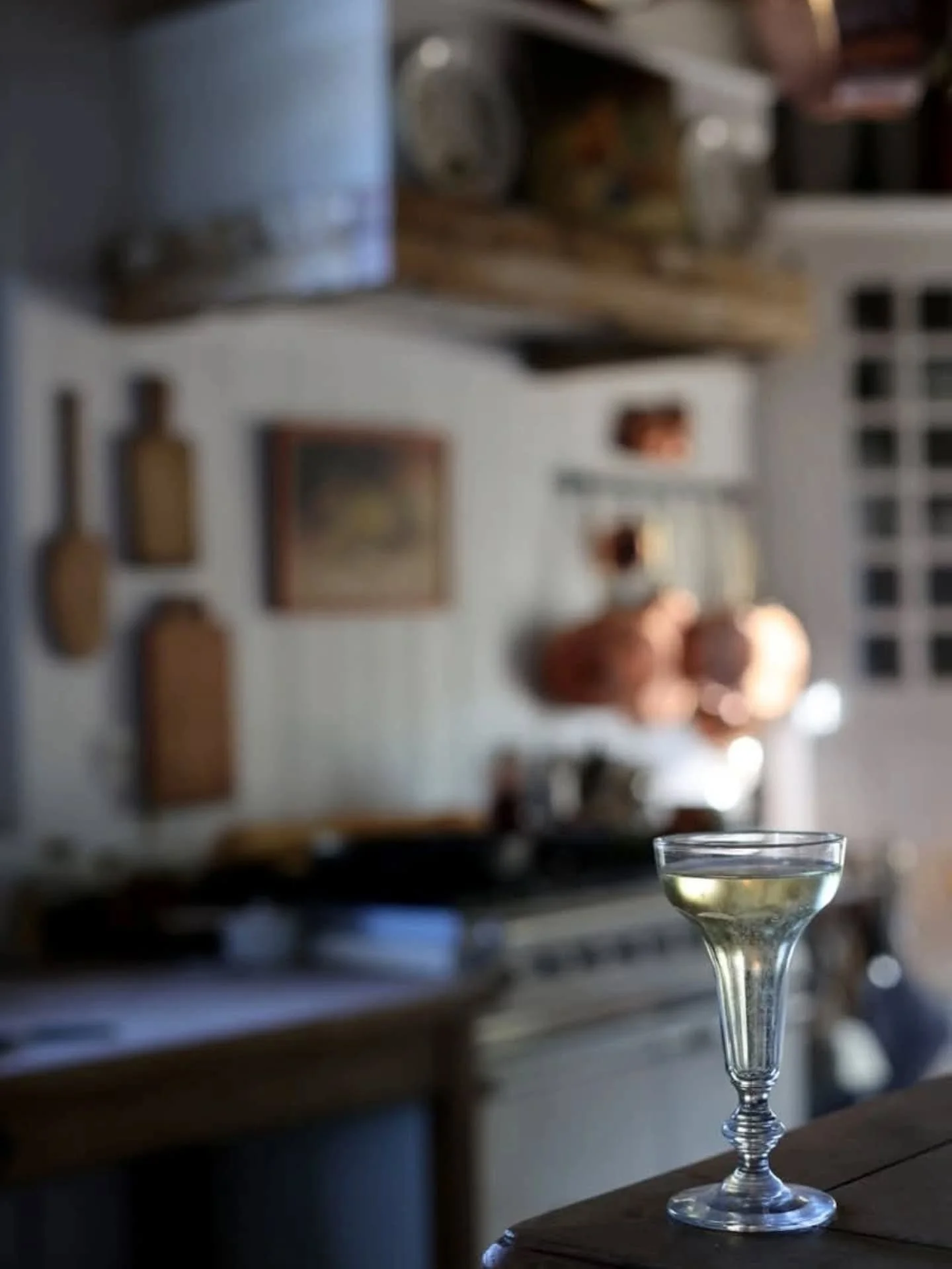 How was your weekend? Do you feel summer winding down? In my kitchen, this evening I reached deep into the glassware cabinet in search of my favorite champagne glass.

I found this antique champagne glass over 10 years ago in a tiny antique shop in G