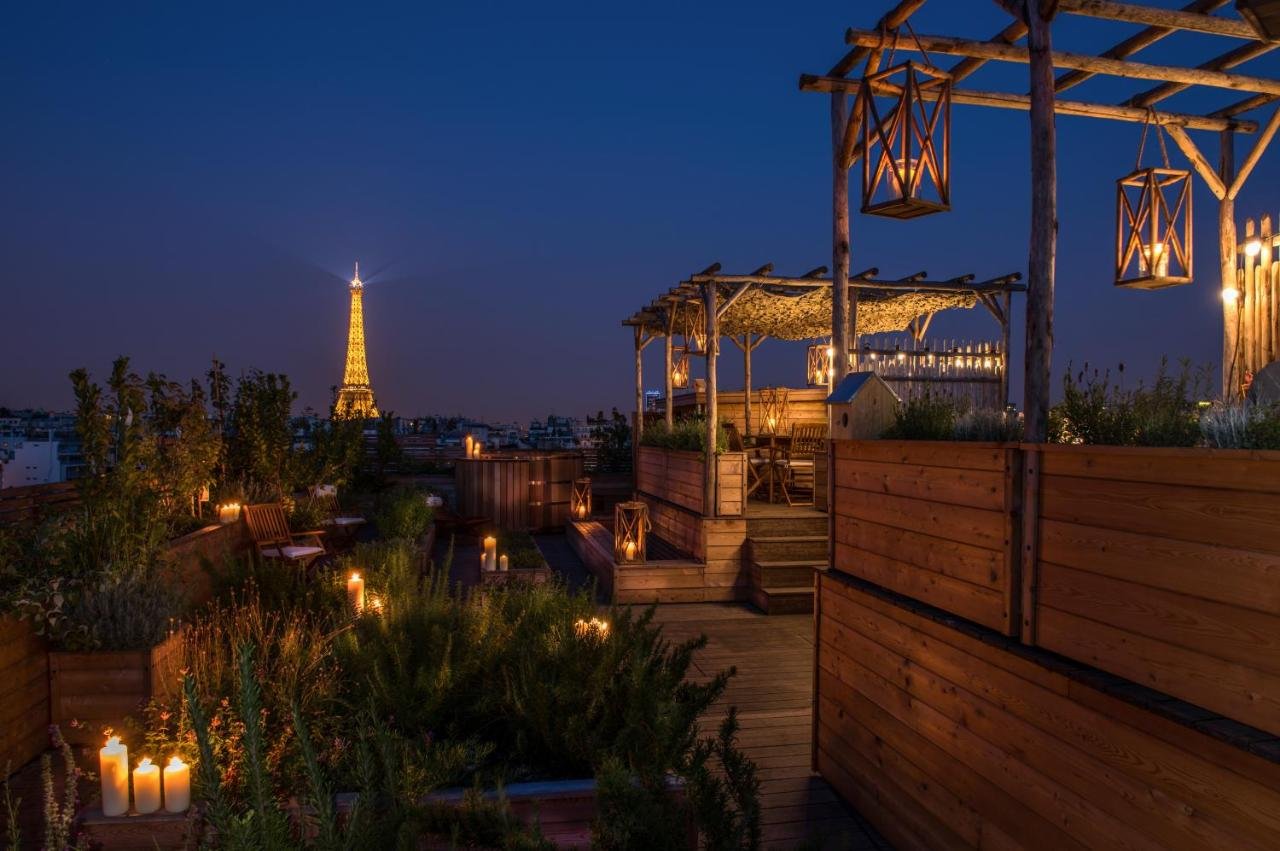 Late evening in Brach's romantic rooftop overlooking the Eiffel Tower