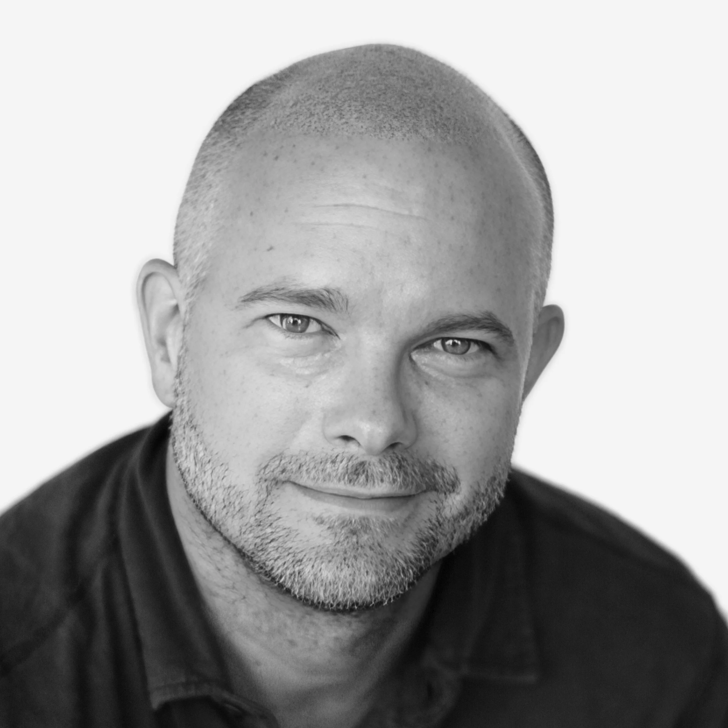 A black and white portrait of Kevin Flatt.