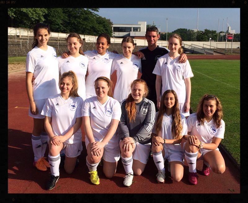 The girls' soccer team: They played Varsity 11-aside at the NECIS tournament. They fought a valiant battle!