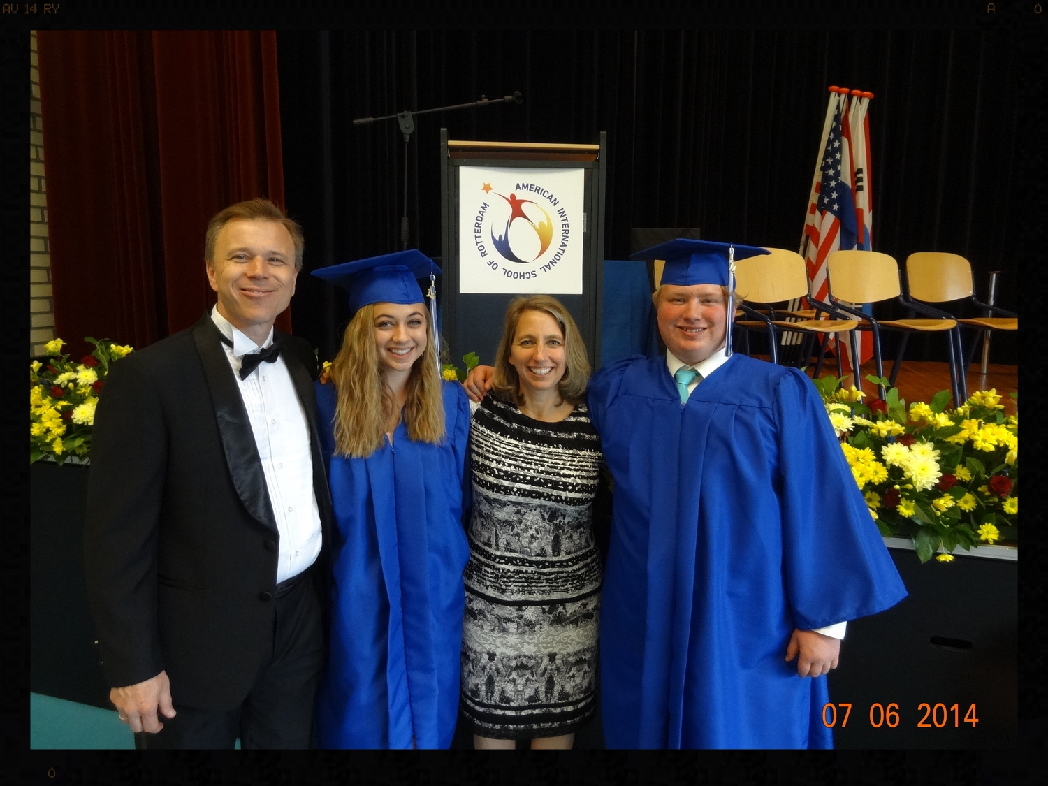 My husband and I with our graduated seniors.