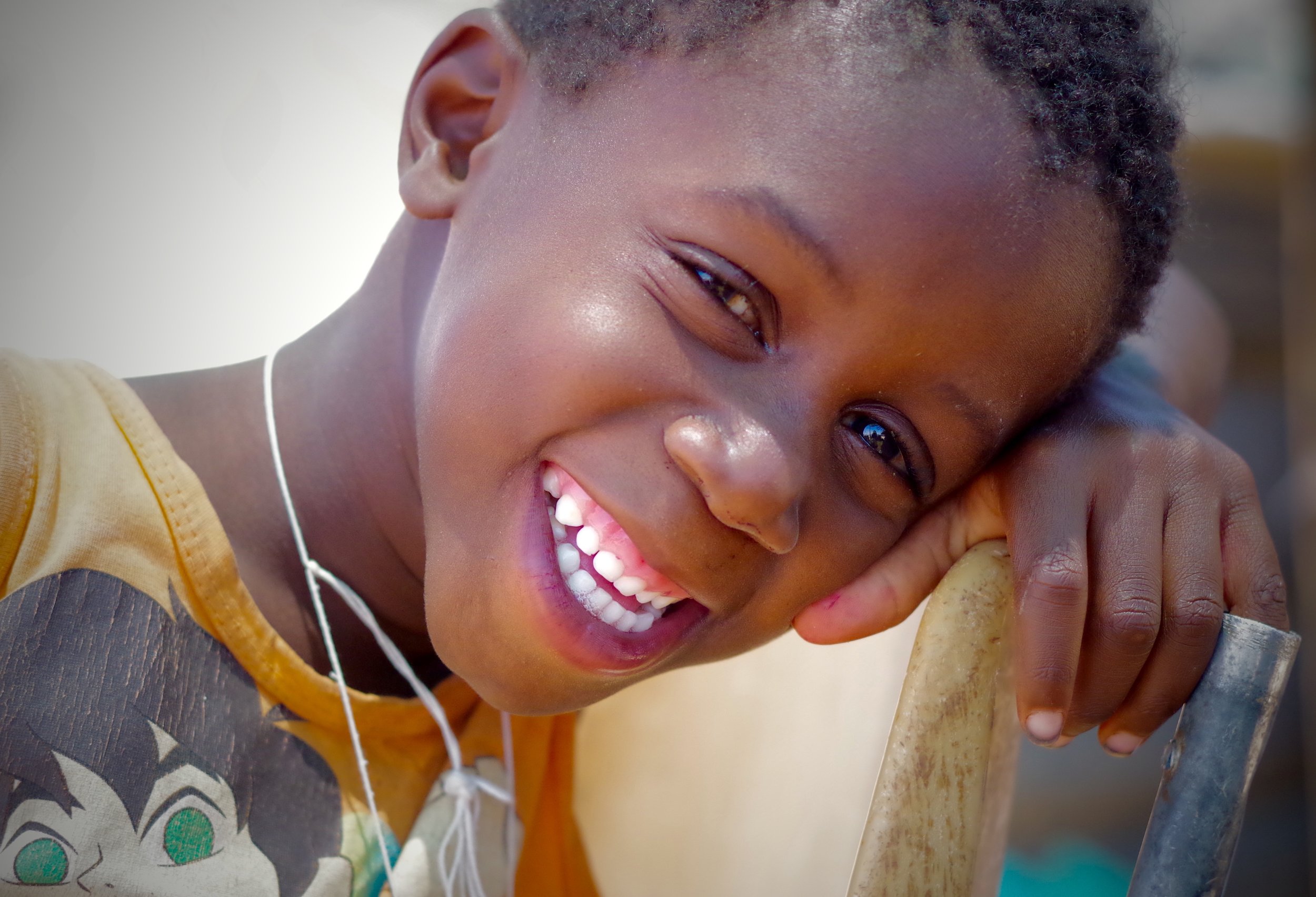 Morning Smiles Before the heat of the day becomes unbearable, children are happy enough playing in the dusty fields.