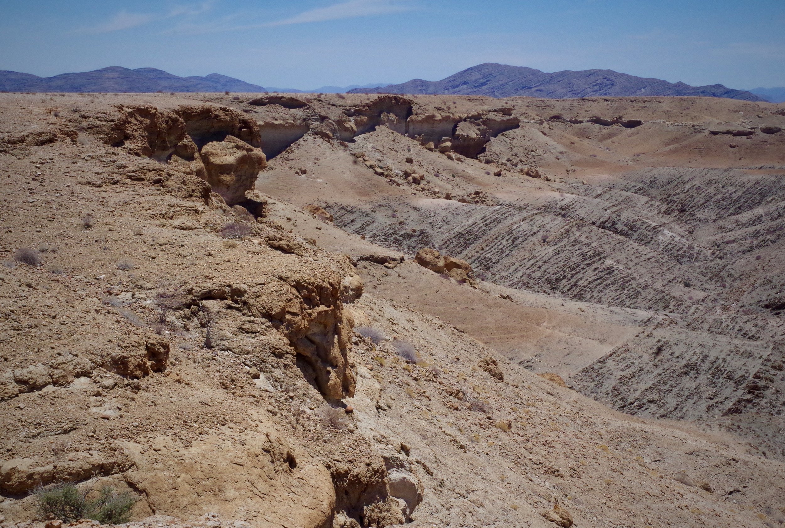 Barren Rock meets sand and sand meets scrub. The desert provides very little for its inhabitants during the dry season.