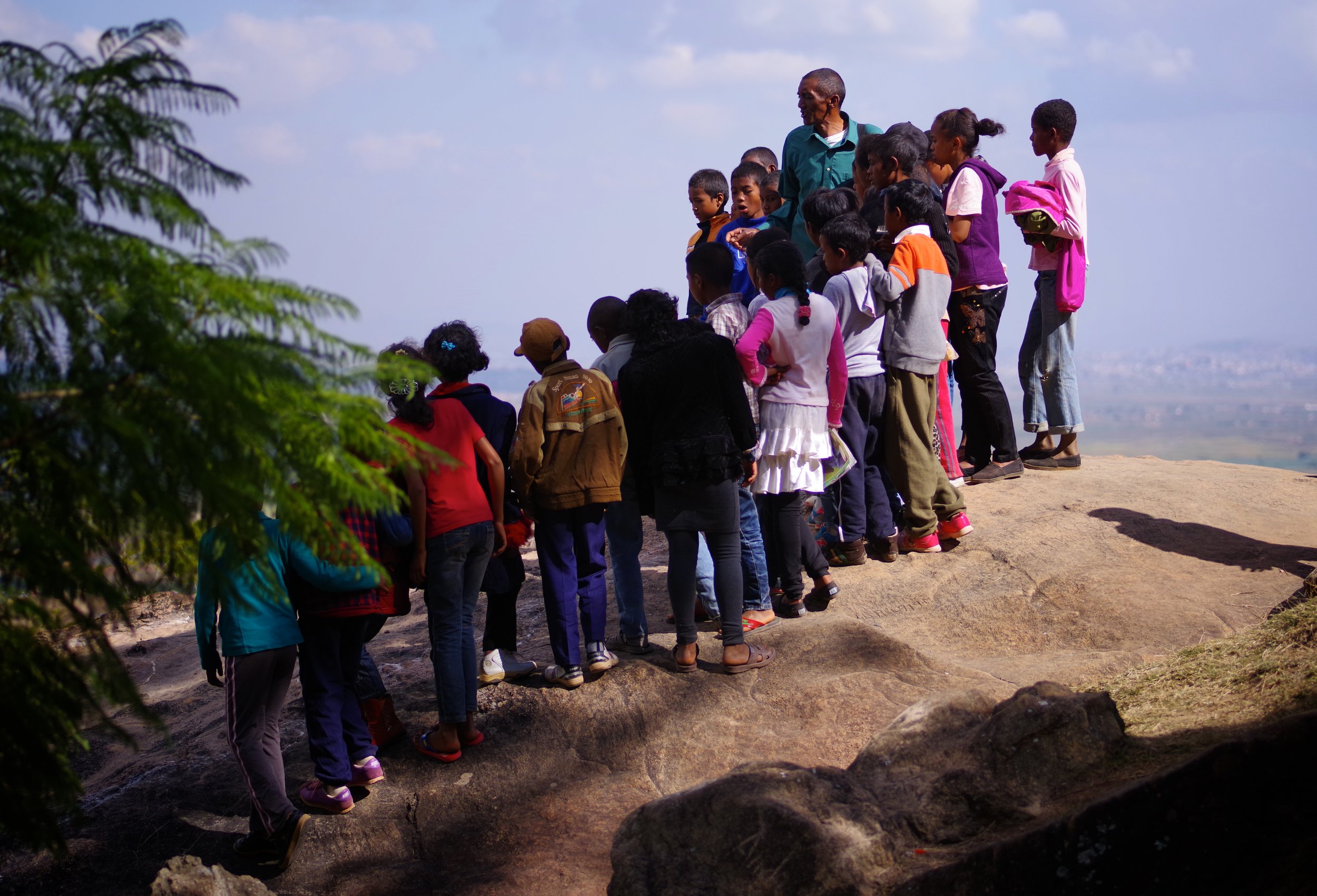 School Trip A class is brought to an ancient fortress and treated to a fine view of their home city.