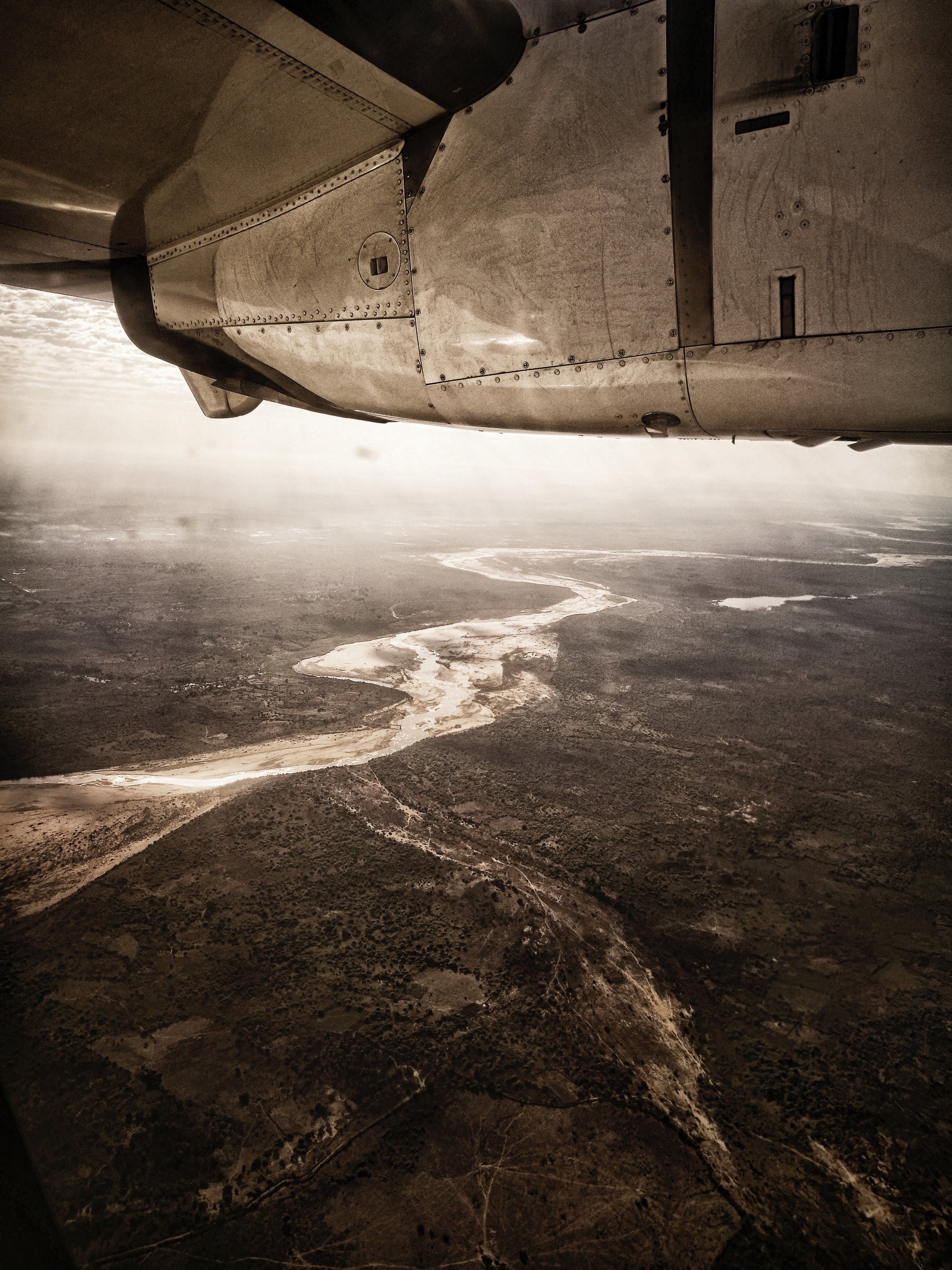 The Betisboka It was one of the most powerful rivers I had ever seen. A great sea of mud thrashing against granite rock faces with the force of an earthquake. We crossed it twice, once over a rather wobbly steel bridge, and here from the air.