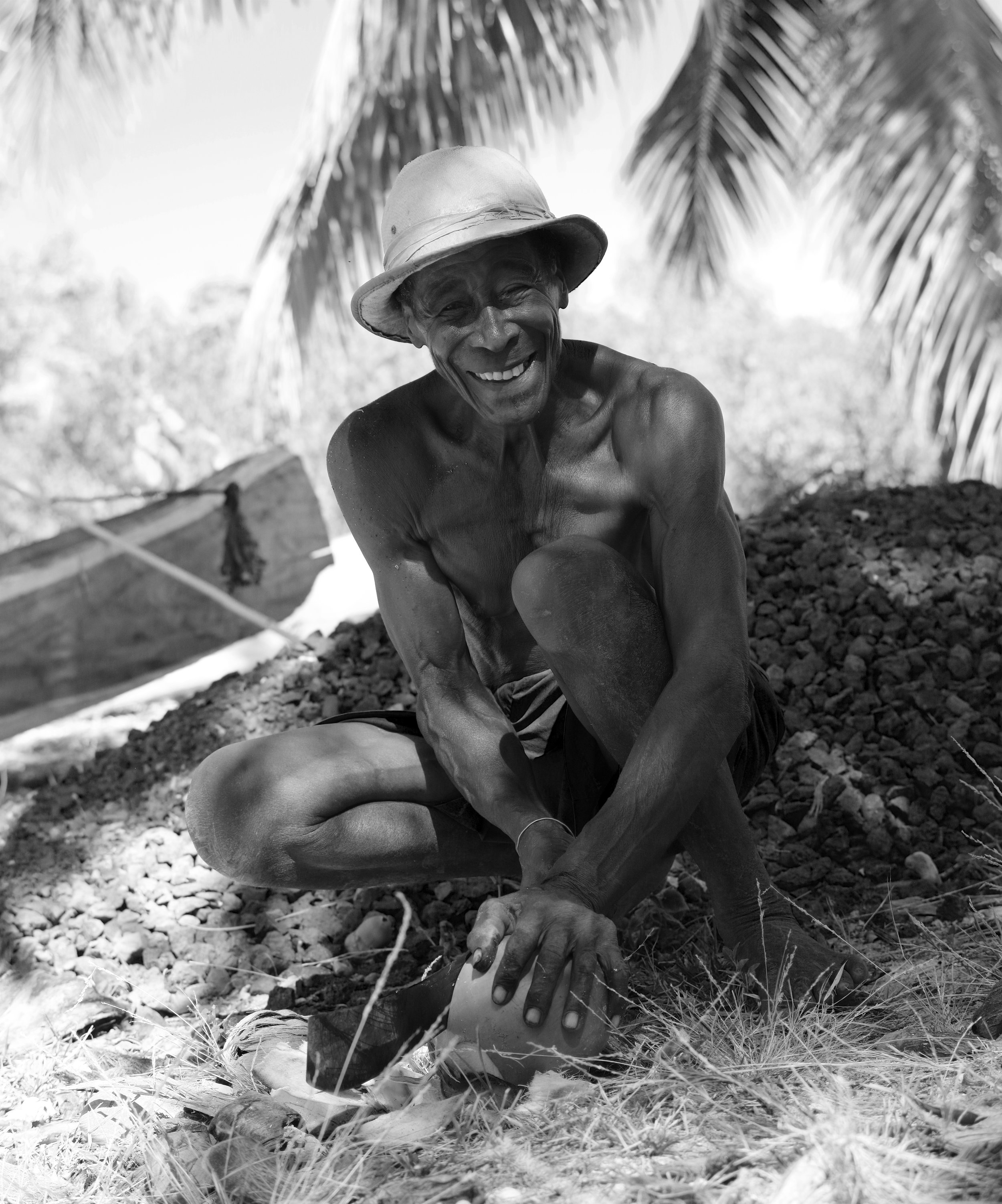 Bushman from Nosy Be The shade of a palm is very welcoming after a morning spent spearfishing in the strong sun.