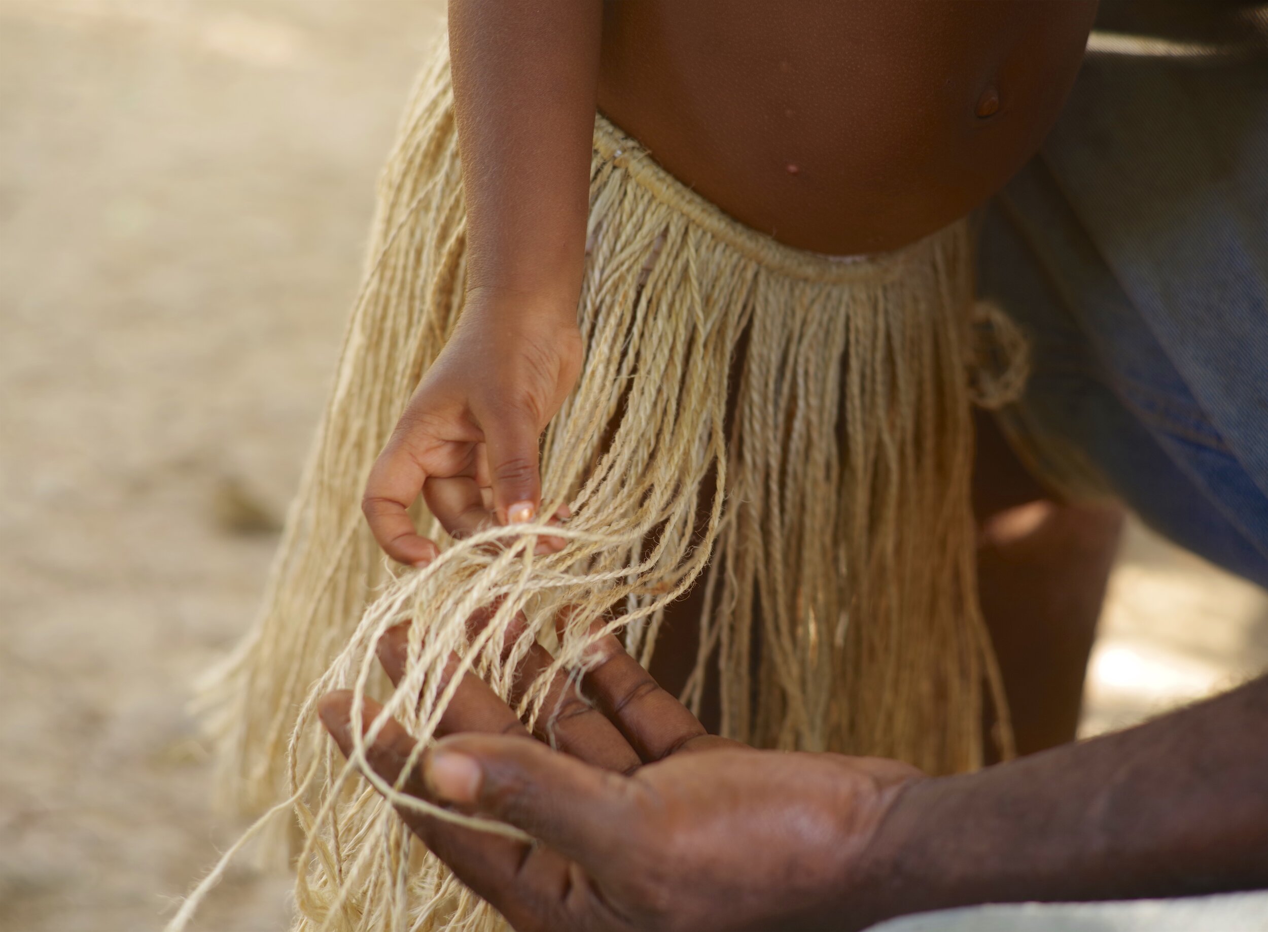 The Grass Skirt Worn during sacred ceremonies and on special occasions, a skirt made from twisted cane leaves and dry grass forms part of the Island’s traditional dress.