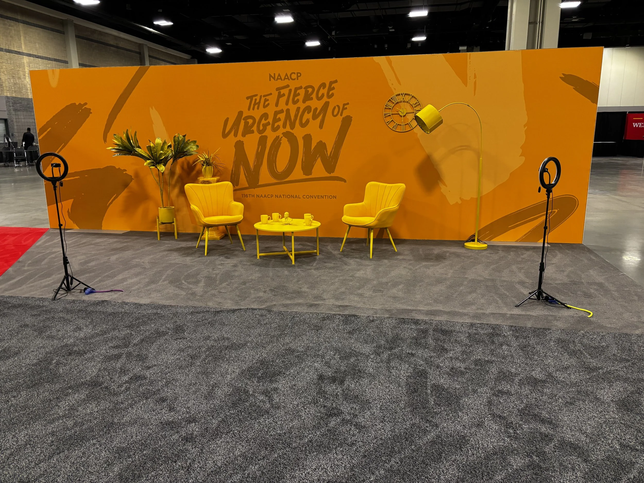  The Podcaster Lounge was designed as a dedicated space for creators to record interviews, host discussions, and connect with their audiences in real time. Unlike the more vibrant areas of the event, this zone embraced a refined monotone palette acce