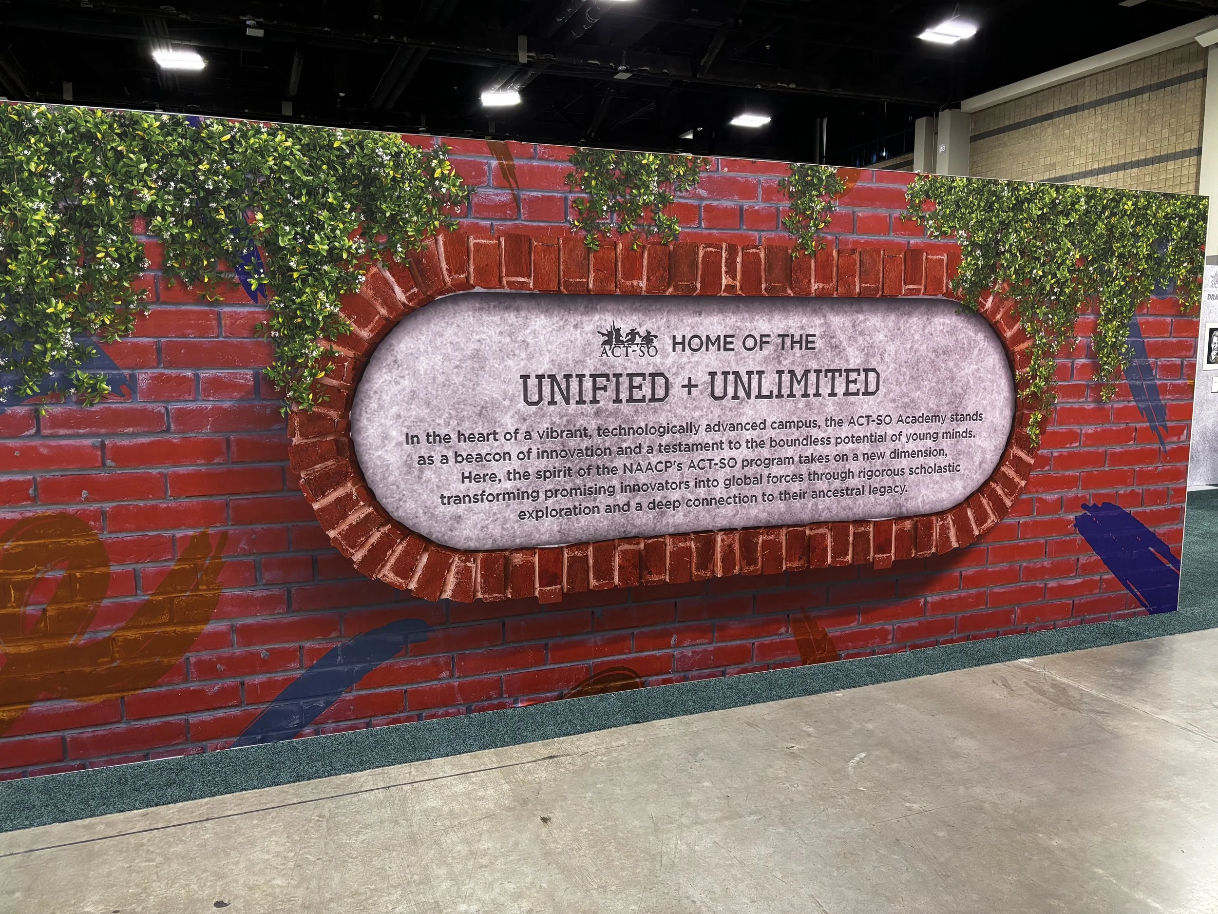  Throughout the event, a series of branded message walls extended the design language established at the entryway. Each wall featured its own focal message — from the empowering  “Unified &amp; Unlimited”  mantra to the inspiring  Prizm Pledge  and a