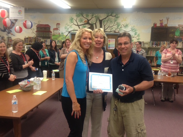 May 19, 2015 Dear Tiogue Faculty and Staff, This is our fourth year presenting the Horace Mann Foundation “Crystal Apple” award. Each year it is awarded to an individual or team to honor and recognize their dedication and special service to our students and school. This year the school faculty and staff nominated four individuals who are all outstanding candidates for so many reasons. Faculty and staff voted for the award winner. This year it is indeed an honor to present the “Crystal Apple” award to John Klos. As our Head Custodian, John is the most professional, hard working, positive, caring, and dedicated person. He is truly one of the most caring and balanced individuals I have ever worked with in a school setting. John is highly ethical in his professional and personal behavior with students, parents, and all of us as staff members. His calm, deeply respectful, and individualized approach with students and staff is truly amazing and so valued. He has often served as a mentor for many of our students. What a gift! John also has a great sense of humor and he makes all of us smile and laugh! He is the optimal role model of our “BRAVE” rules as he is kind, responsible, a learner, and values himself and others everyday. He helps us, especially our students, to make us all feel and believe that “Everybody is Somebody at Tiogue School!” John has worked as a custodian for the district since 2003. Since that time, his hard work and dedication to our district clearly shows. As Jason Martin, our Facilities and Technology Director noted “I would like to add that John has always been hard working and is not afraid to do whatever needs to be done for his school and the district. His dedication and commitment to Tiogue makes Tiogue one of the cleanest schools in the town.” I am sure that we would all agree. John is one of the most flexible, responsive, and supportive staff members. John is also a dedicated husband, father and now grandfather. John, remember that you are loved, appreciated, and valued everyday by the entire school community at Tiogue. Congratulations on being awarded this special and well deserved “Crystal Apple” award today. Special thanks to Colleen Mannuppelli and the Horace Mann Foundation for all of their support with this special gift and recognition. With Sincere Appreciation and Gratitude, Louise 