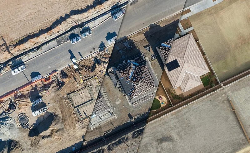 Drone aerial photograph showing multiple phases of residential construction progress from foundation and framing to completed home in Southern California.